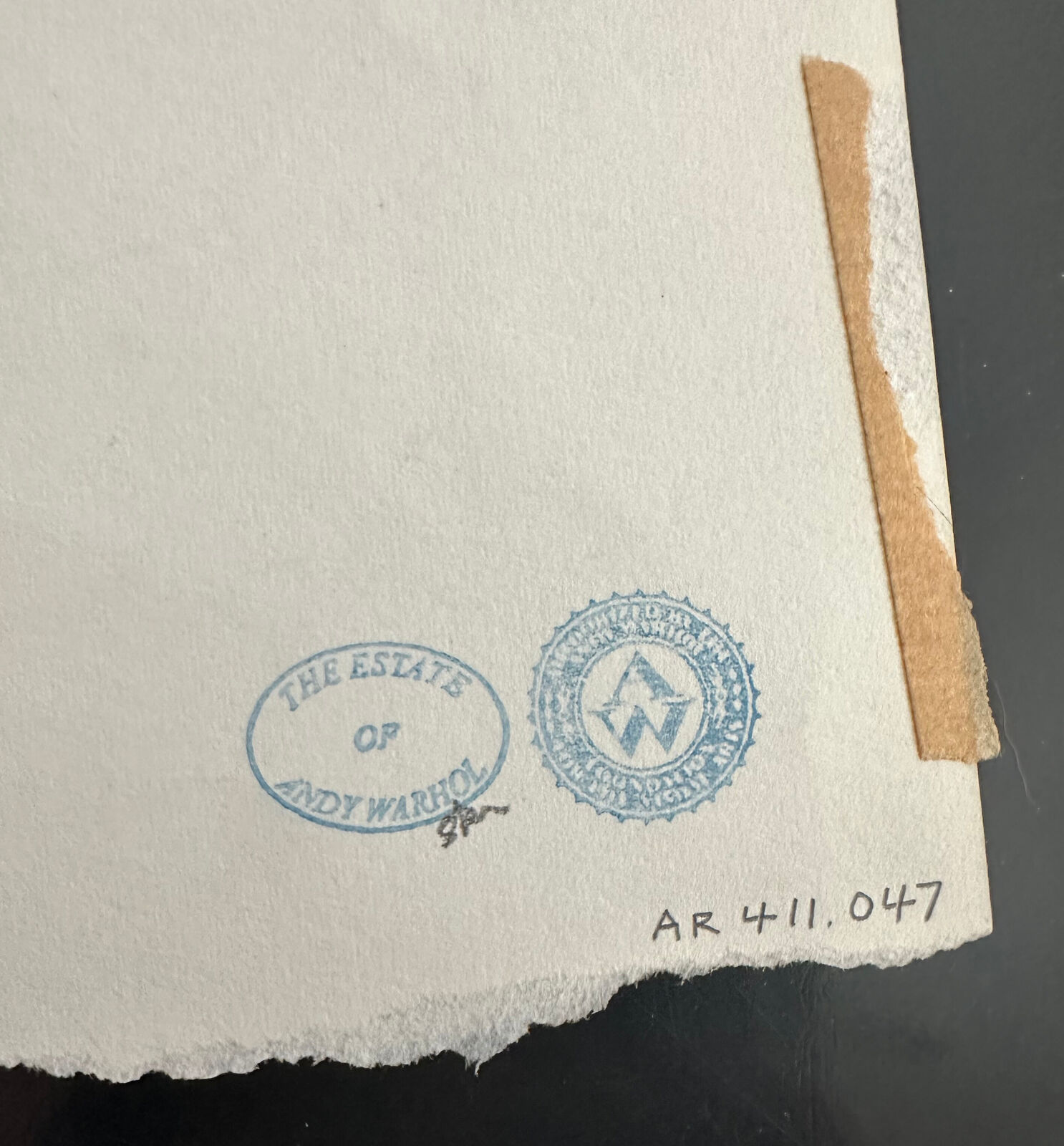 A drawing of three pairs of shoes on a piece of paper.