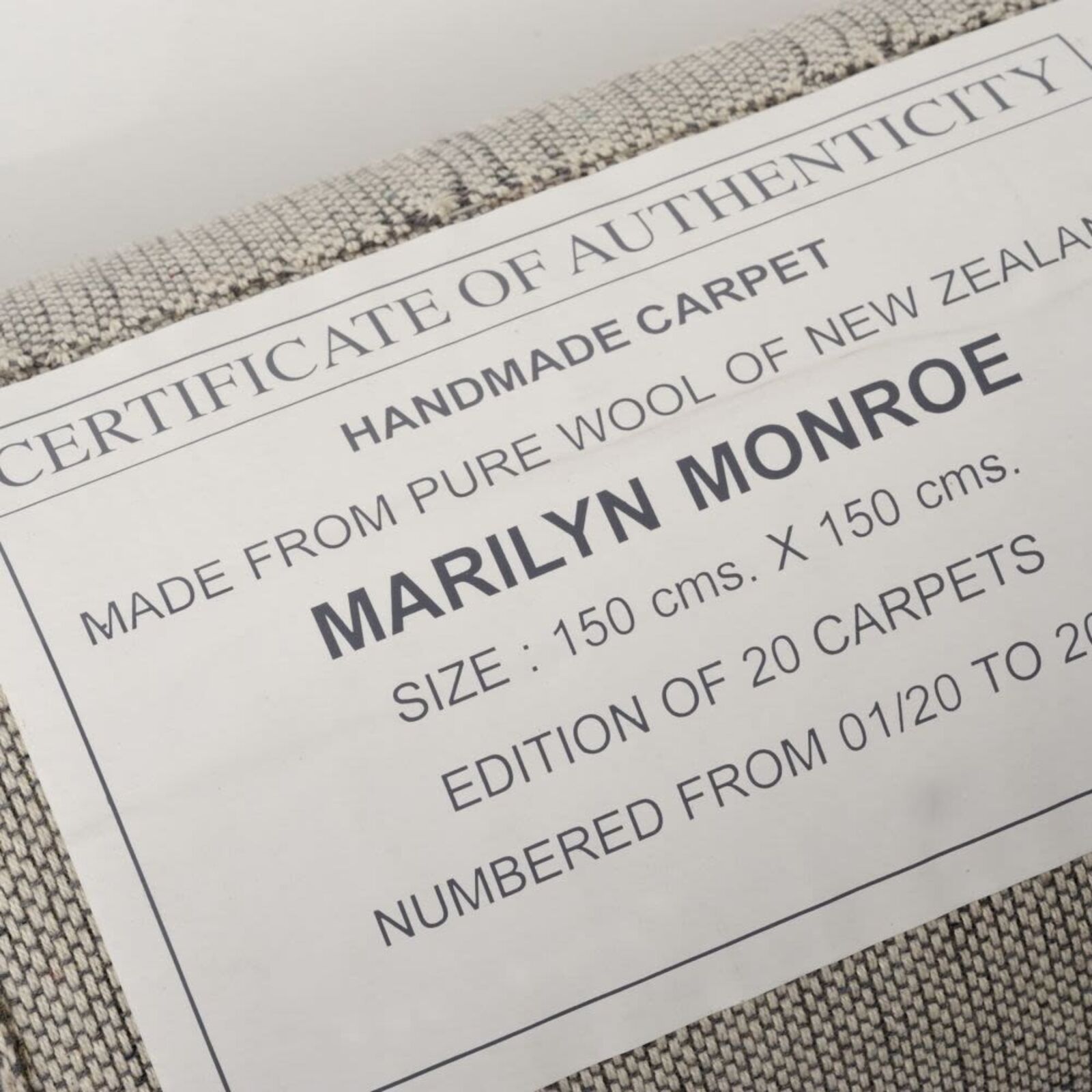 A black and white image of a woman's face.