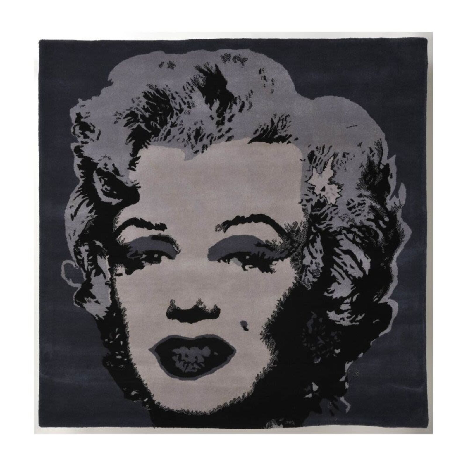 A black and white image of a woman's face.