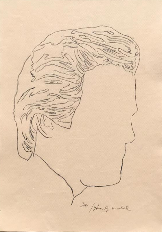 A drawing of a man's head on a piece of paper.