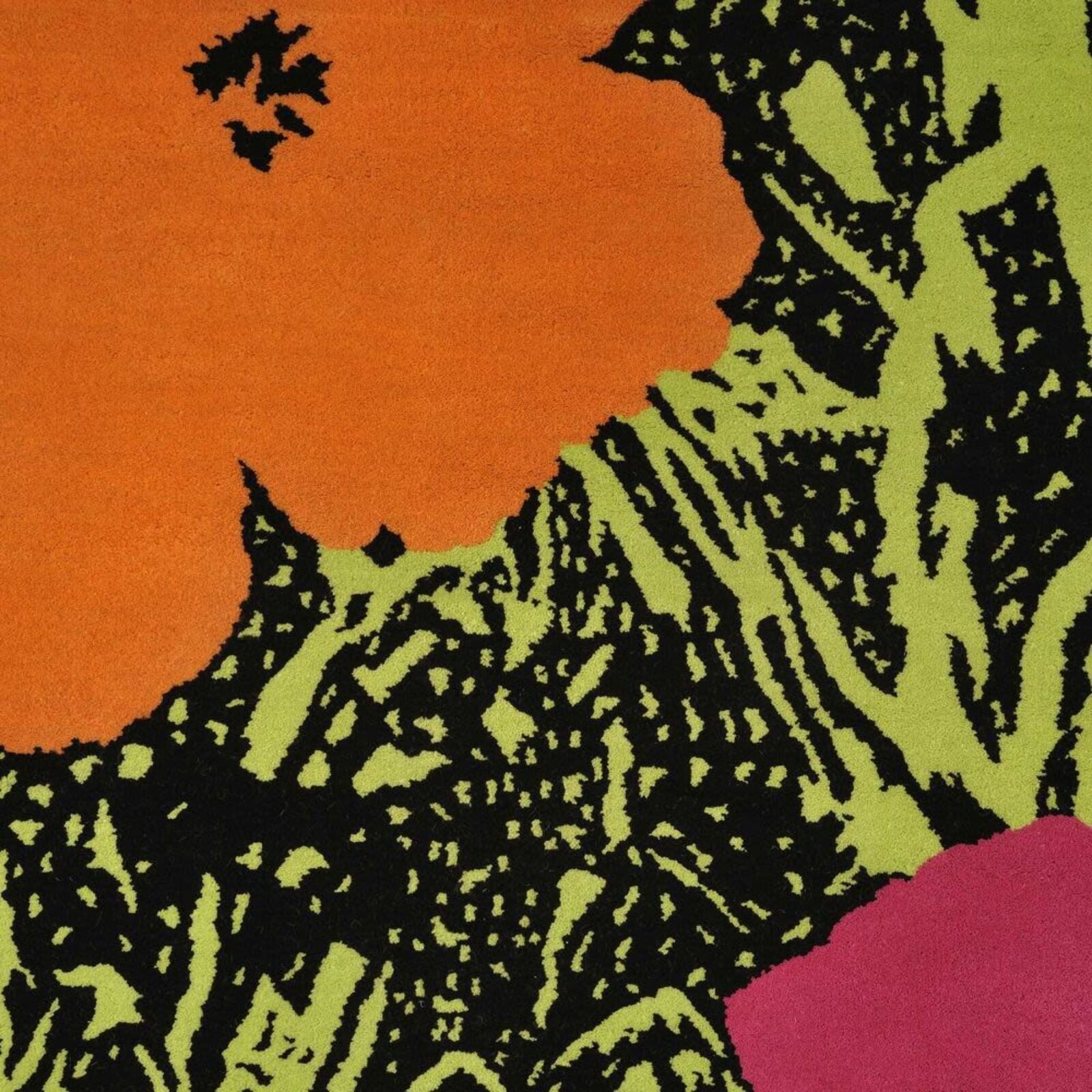 A painting of three red and orange flowers on a green background.