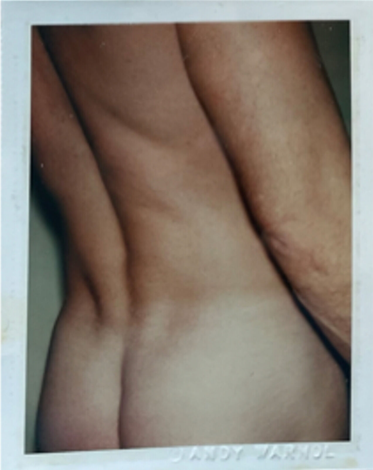 A close up of a person's stomach with a white background.