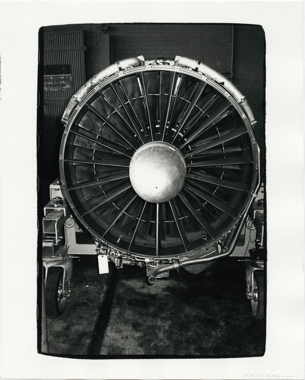 A black and white photo of a jet engine.