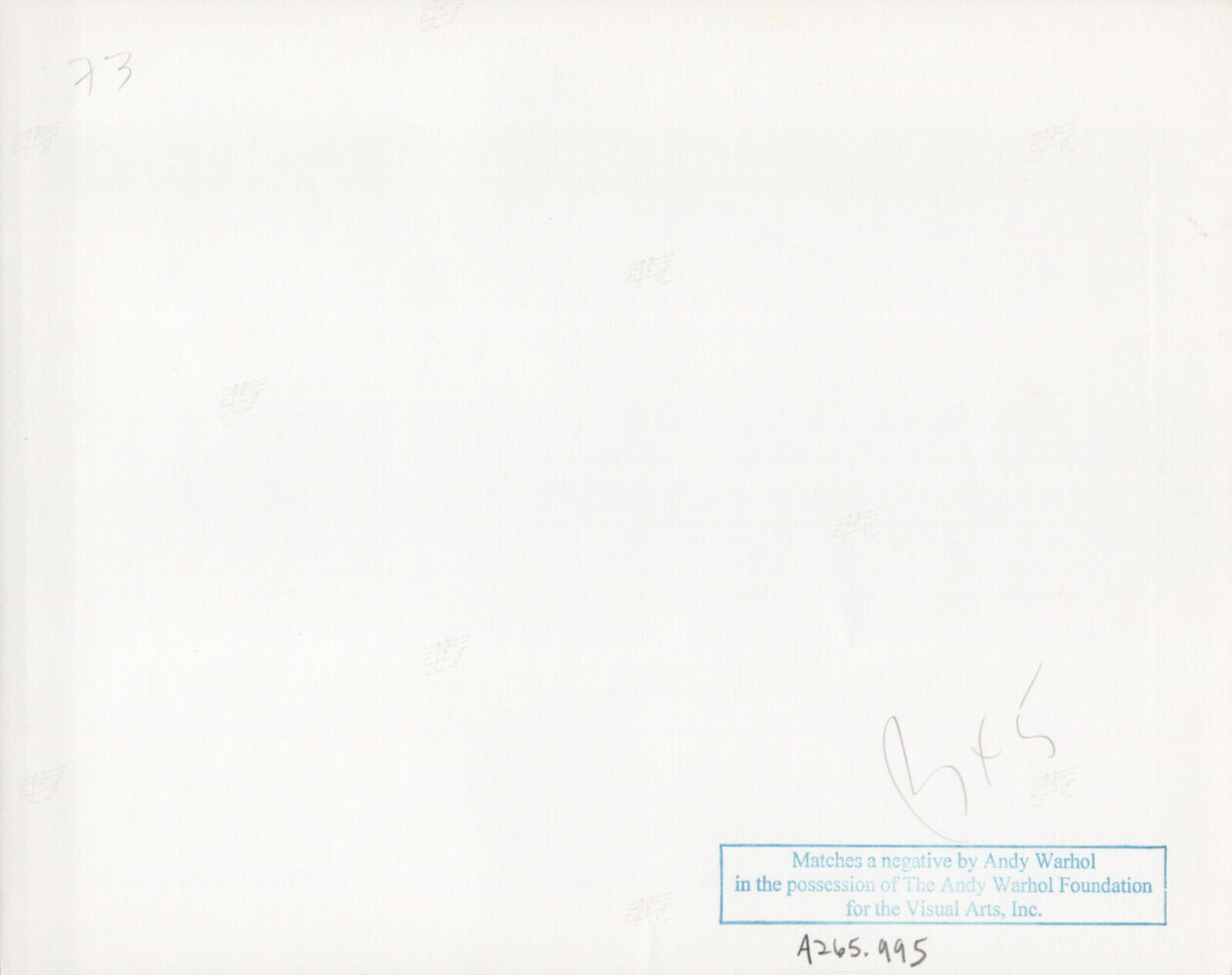 Two women standing next to each other holding wine glasses.