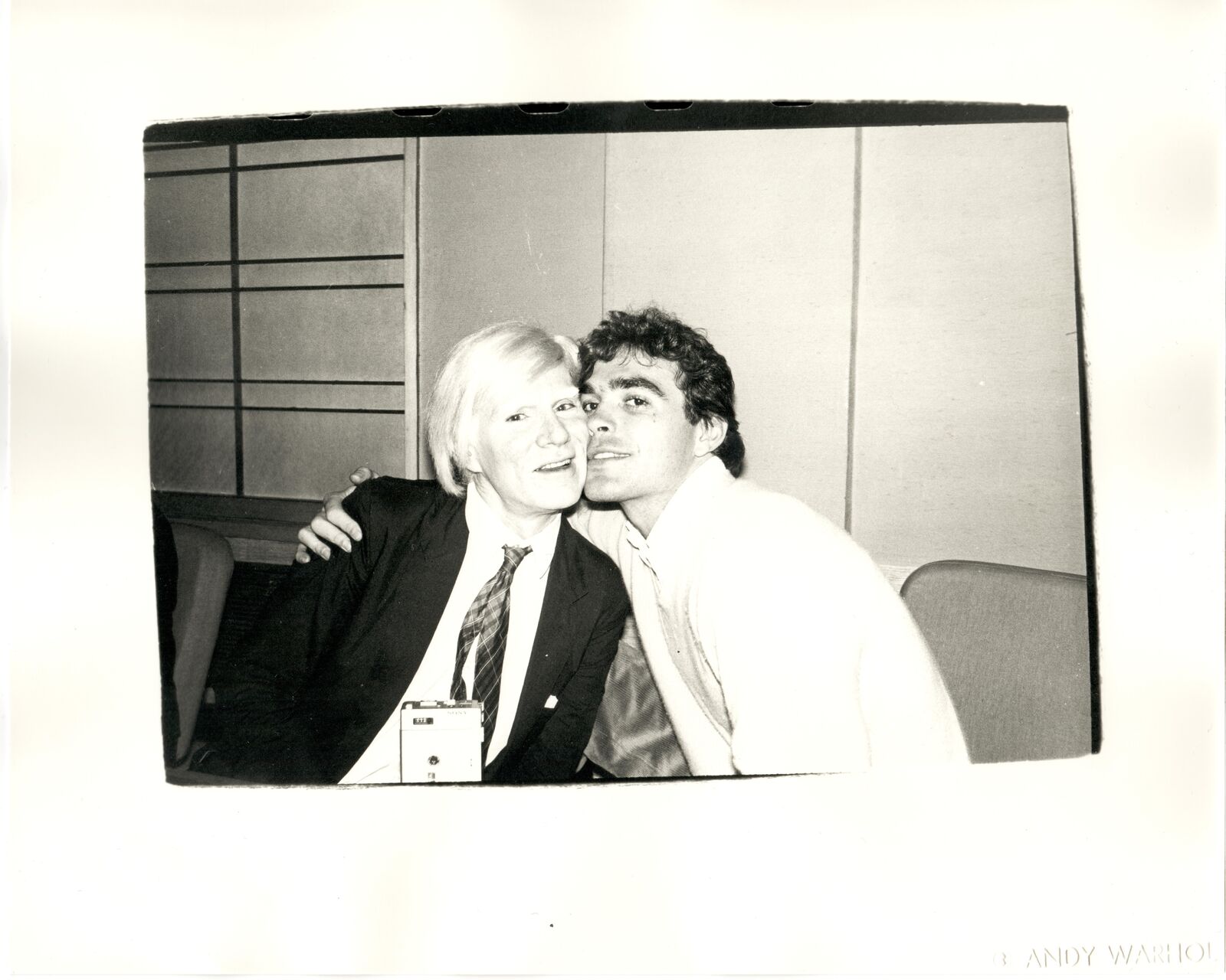 A black and white photo of a man and a woman.