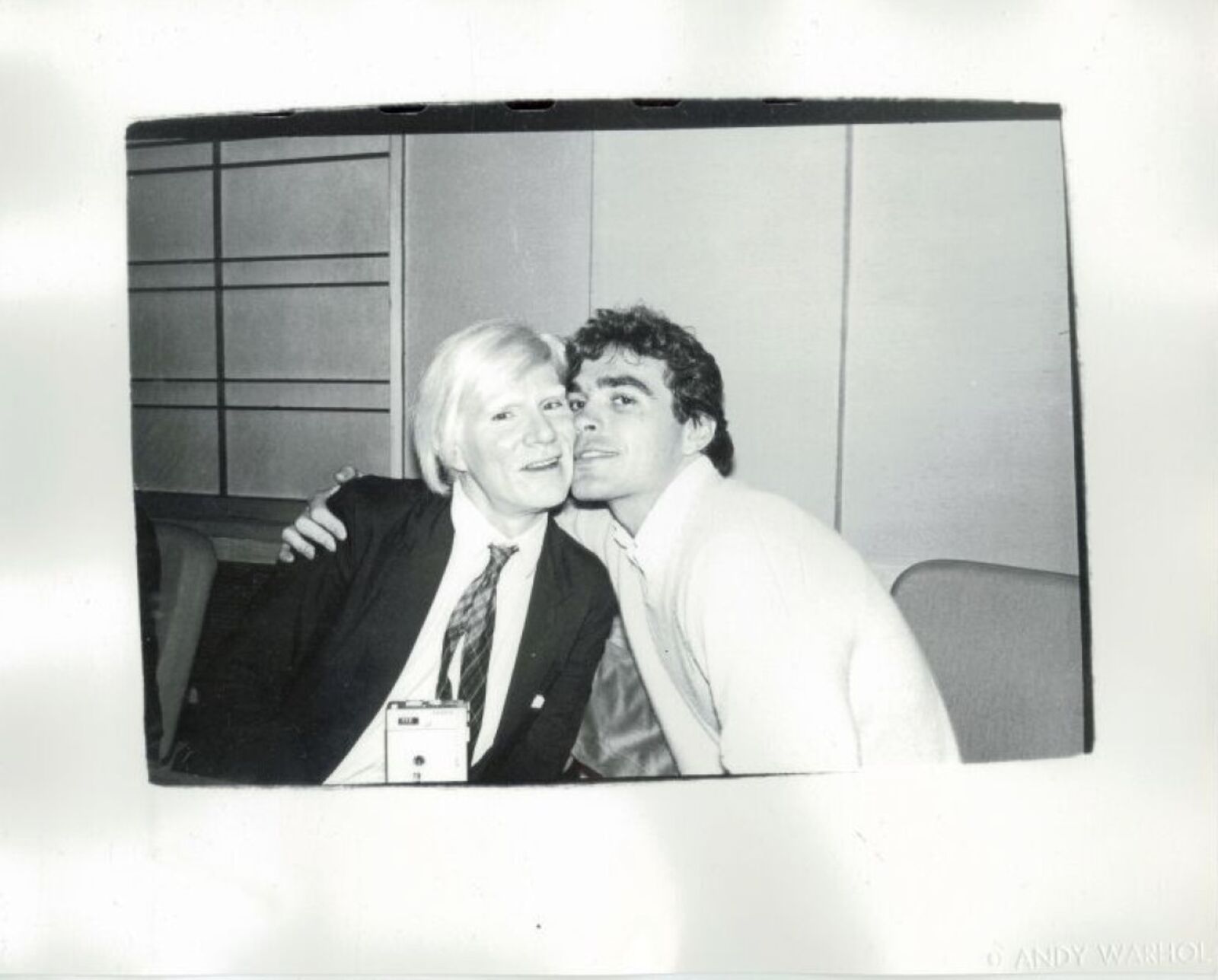 A black and white photo of a man and a woman.