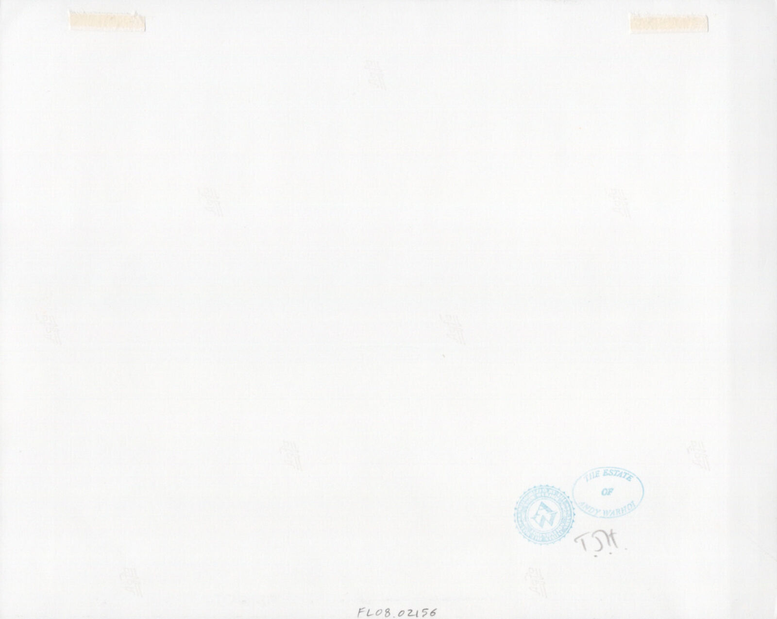 A group of people sitting around a table on a patio.