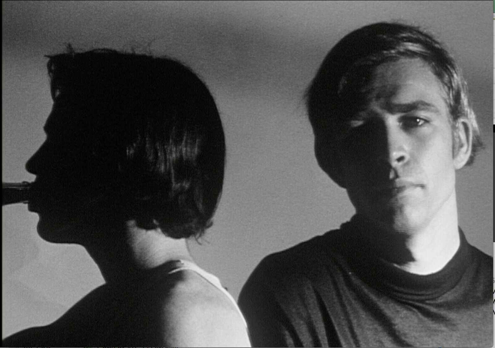 A man and a woman standing next to each other.