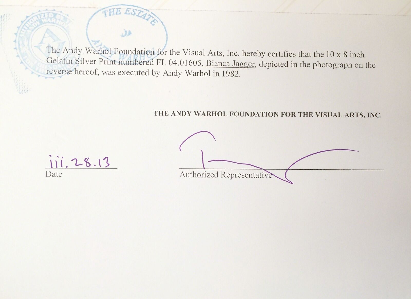 A black and white photo of a woman in a sailor's hat.