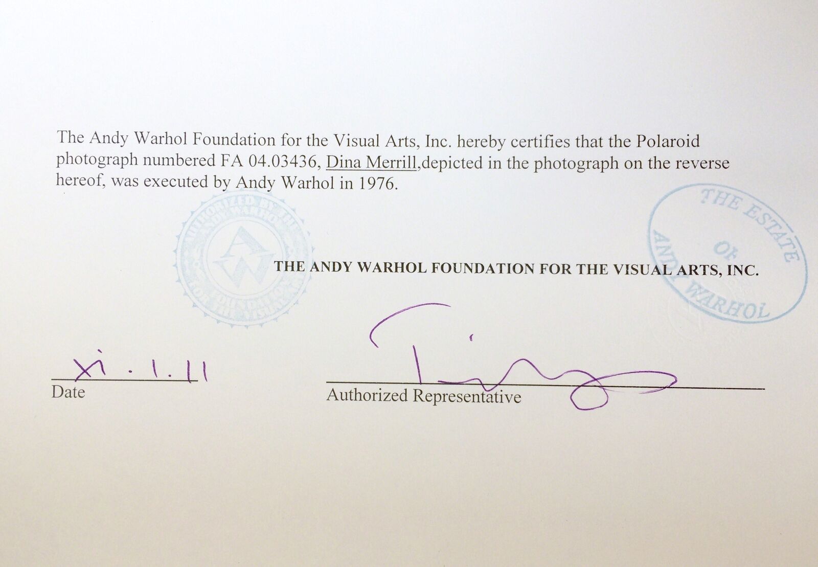 A polaroid photo of a woman with blonde hair and blue eyes.