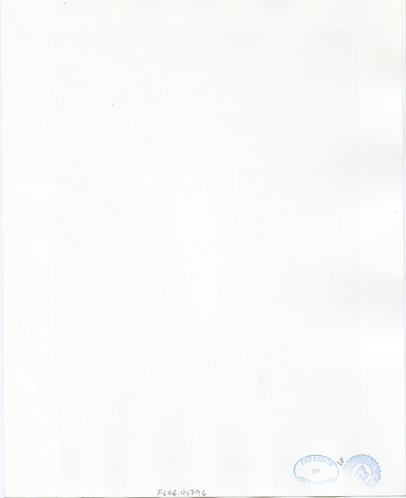 A man and a woman standing next to each other holding wine glasses.