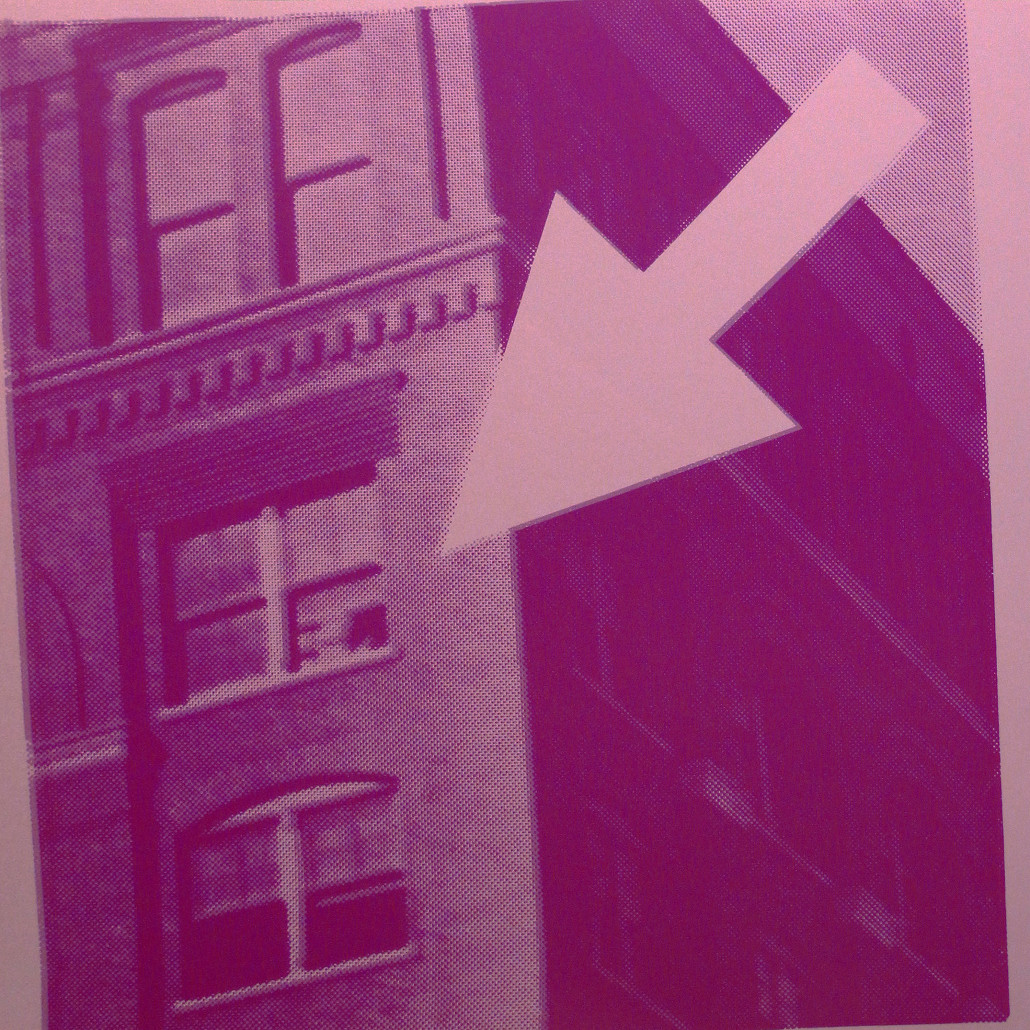 A picture of a building with an arrow pointing to the right.