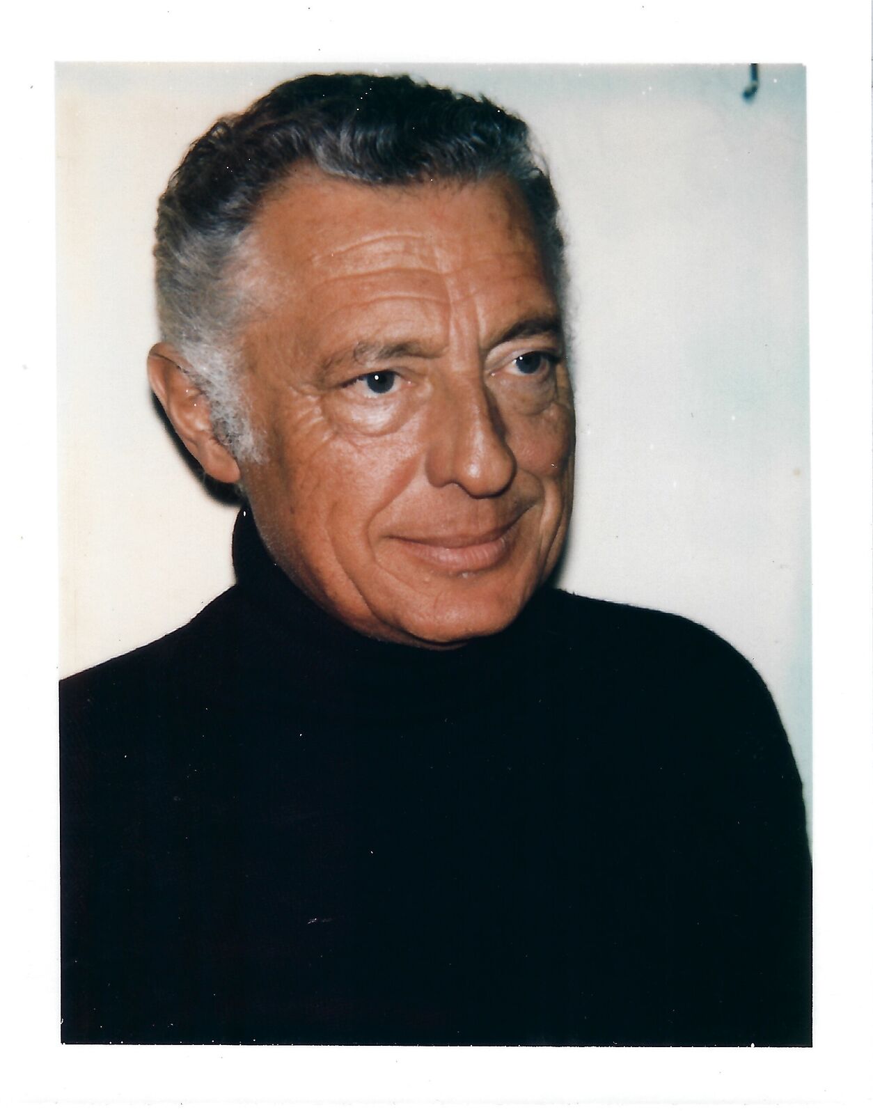 A close up of a man in a black shirt.