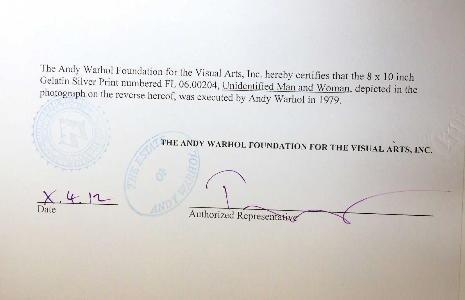 A black and white photo of a man and a woman.