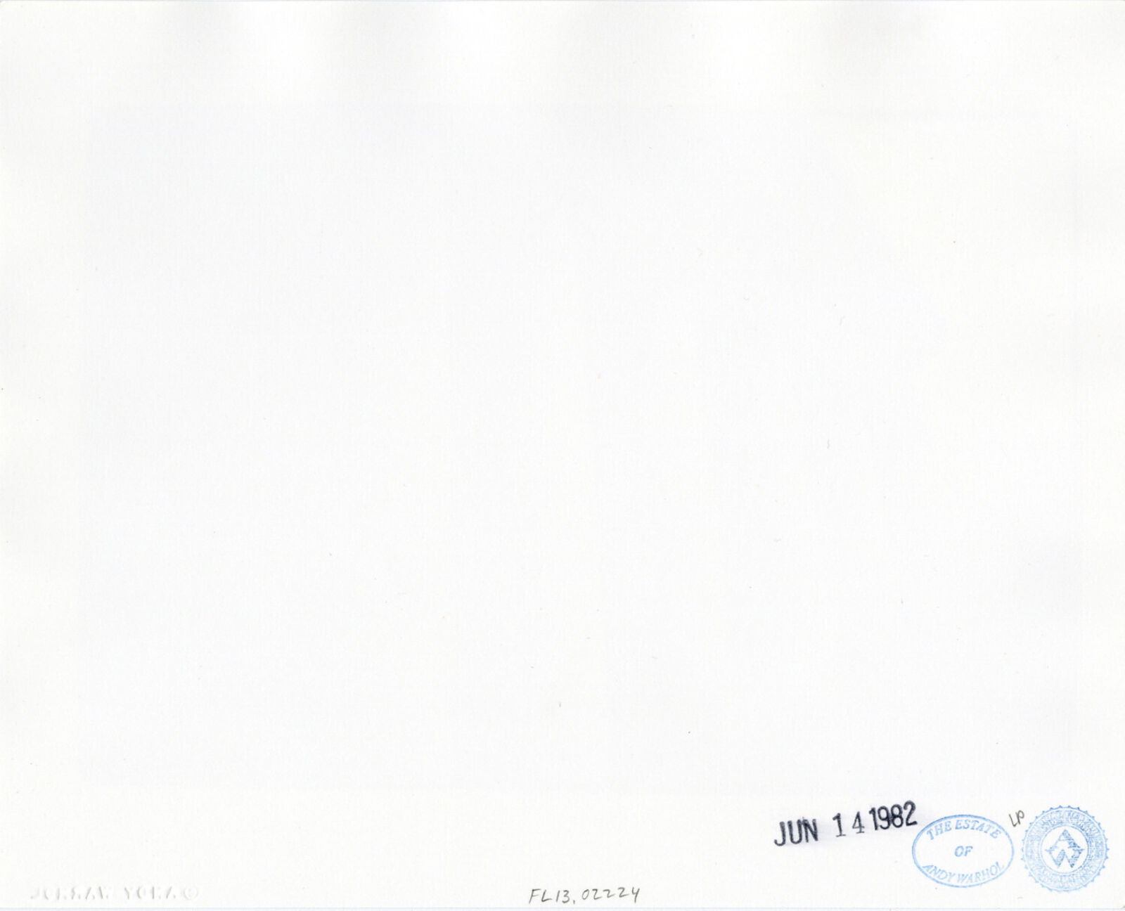 A black and white photo of a building with columns.