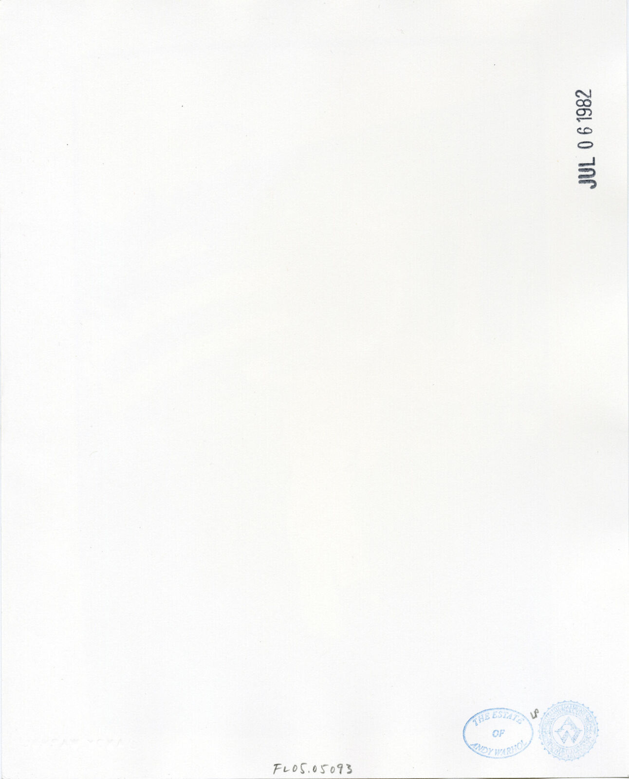 A man holding an American flag in front of a house.