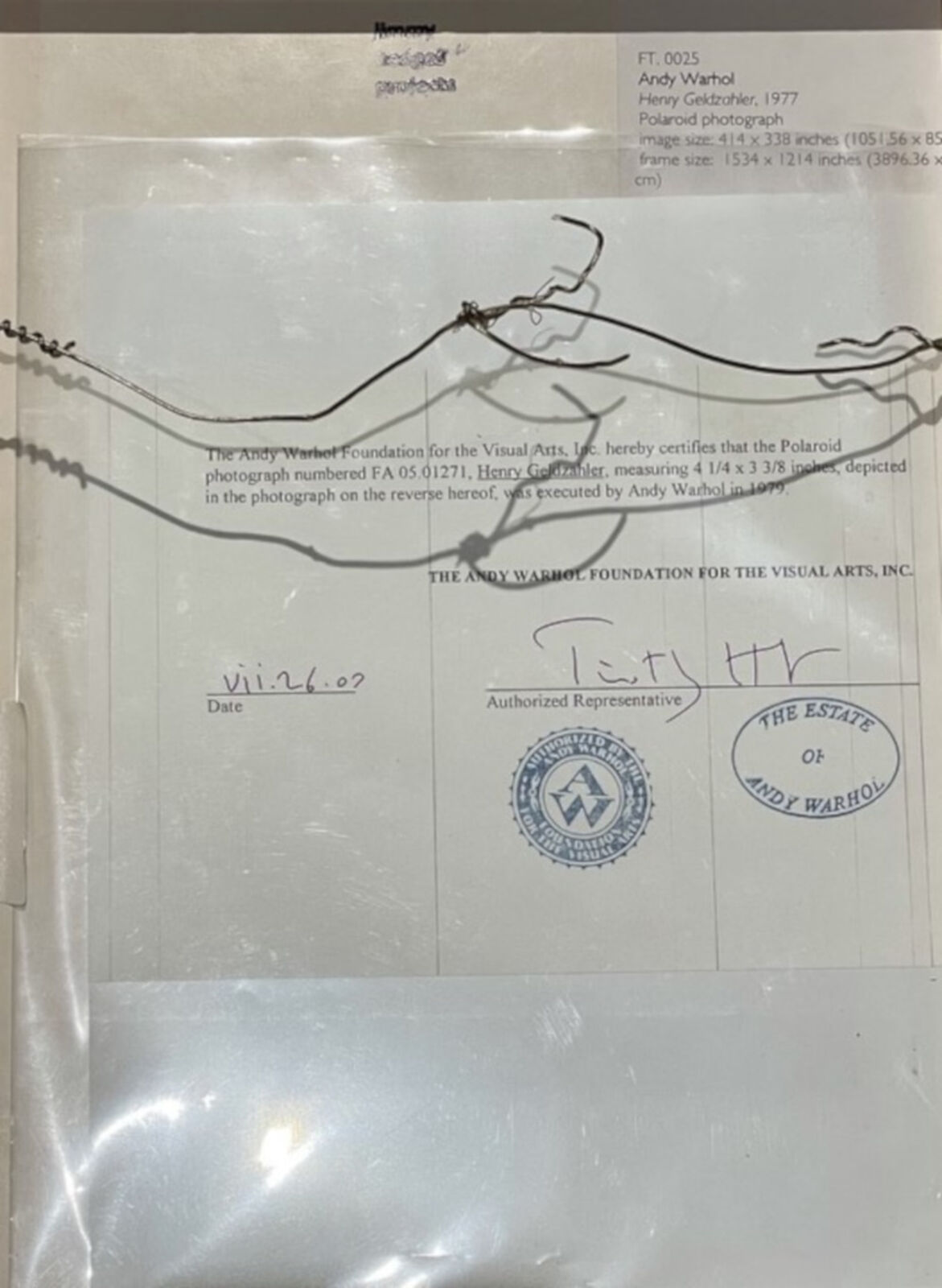 A man with a hat and a cigar in his mouth.