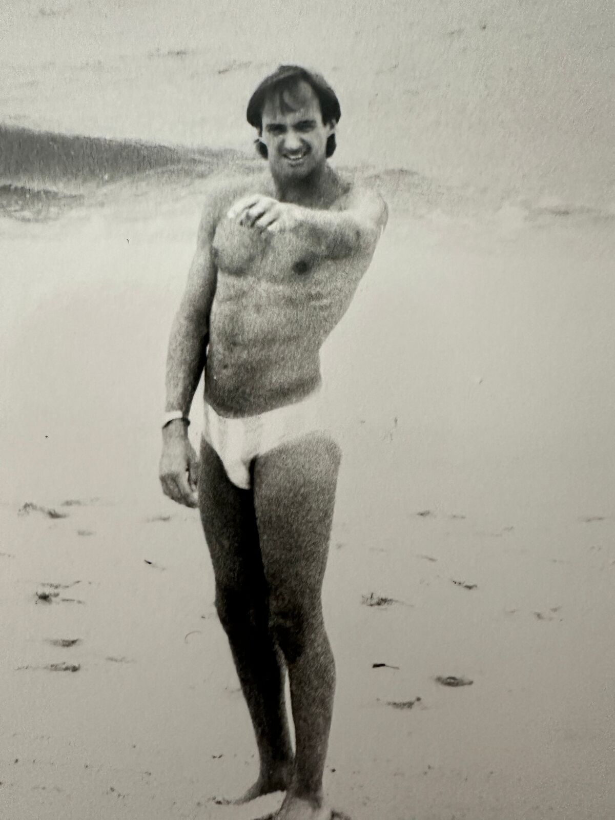 Artwork by Andy Warhol, Jon Gould Pointing on Fire Island Beach, Made of Unique silver gelatin print 