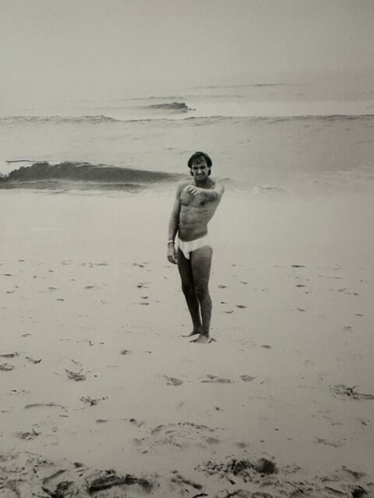 Artwork by Andy Warhol, Jon Gould Pointing on Fire Island Beach, Made of Unique silver gelatin print 