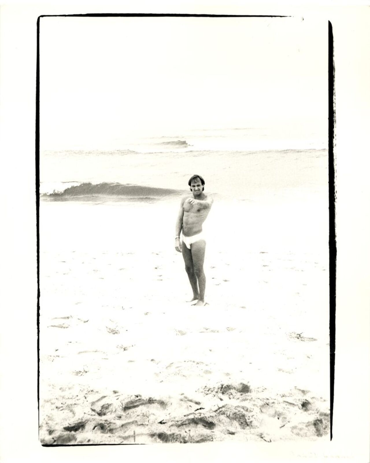 Jon Gould Pointing on Fire Island Beach by Andy Warhol, 1982