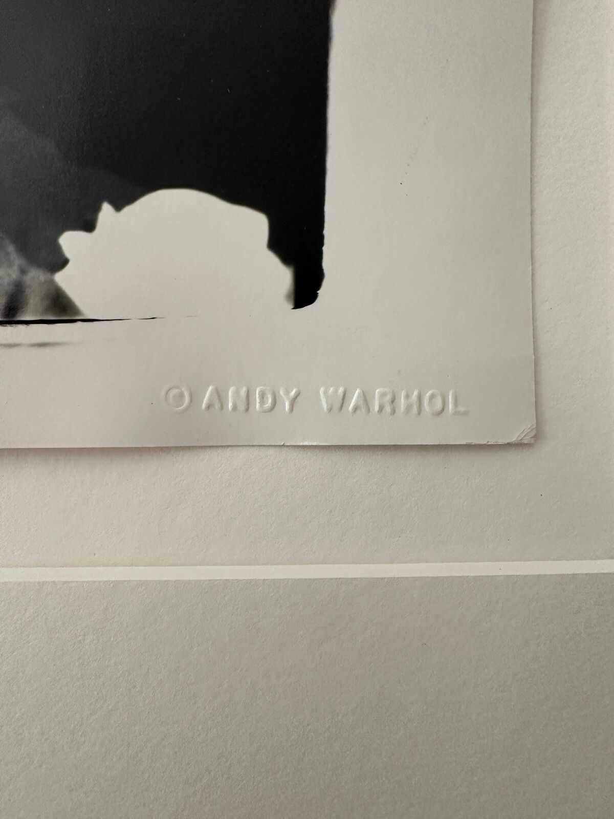 A shirtless man standing next to a woman.