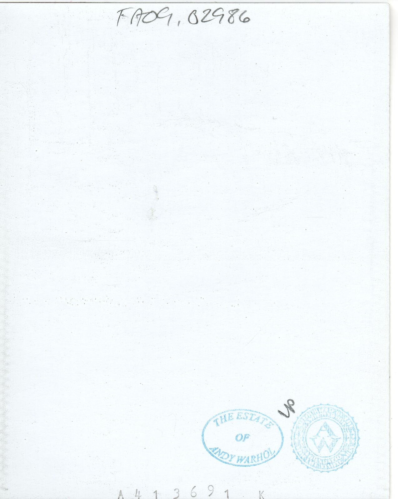 A woman with blonde hair wearing a necklace and earrings.