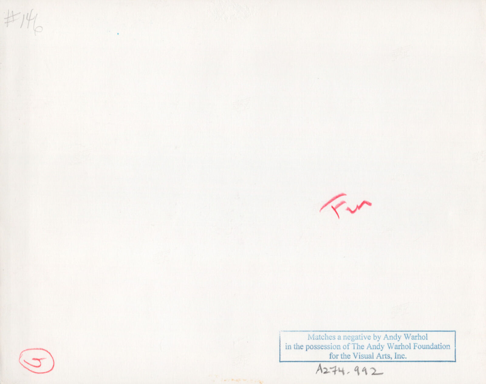 A table with a bottle of wine and a glass of water.