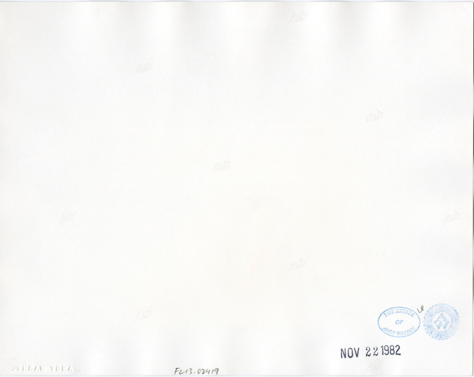 A black and white photo of a truck with a license plate.