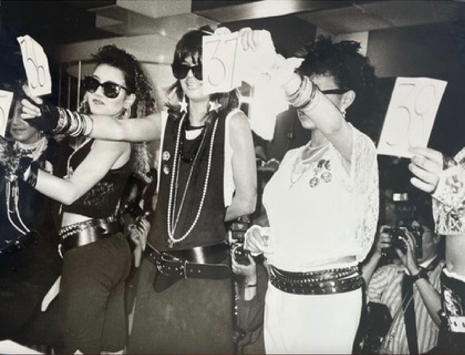 Madonna Look-alike Contest at Macy's by Andy Warhol, 1985