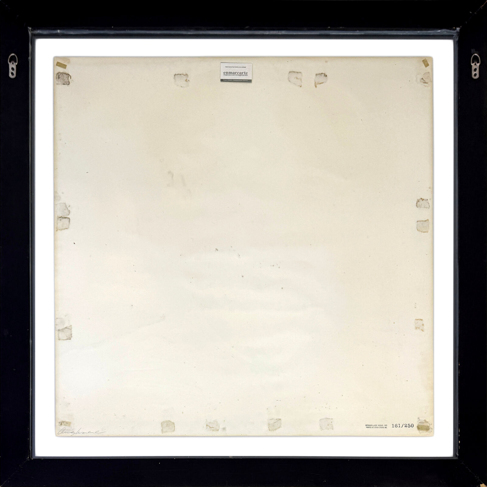 A picture of Mao Zedong in a pink shirt and tie.