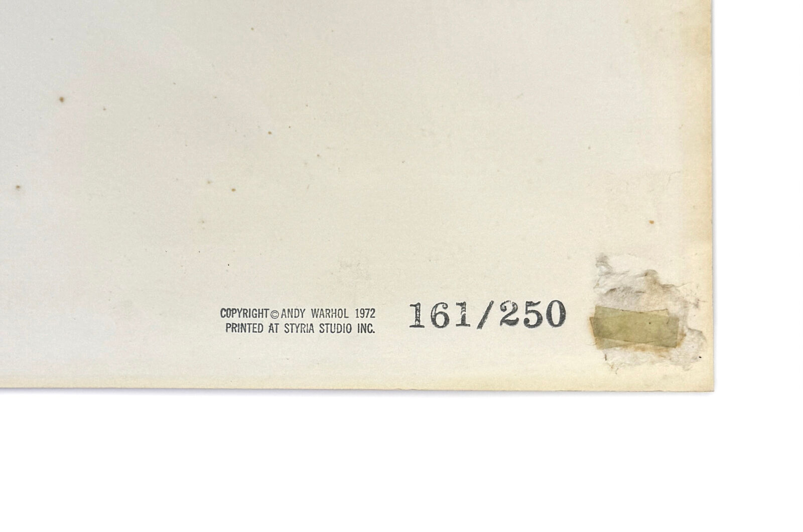 A picture of Mao Zedong in a pink shirt and tie.