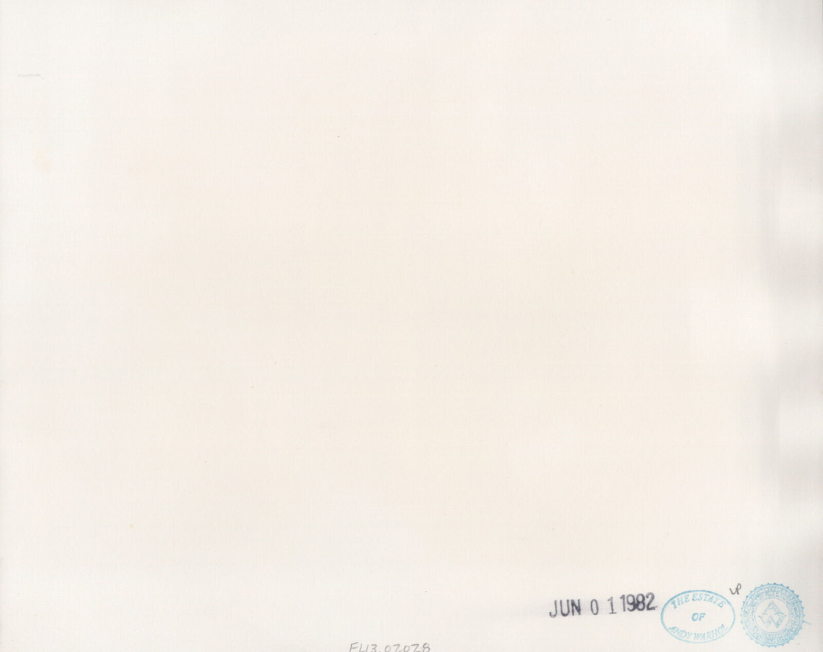 A black and white photo of a building with columns.