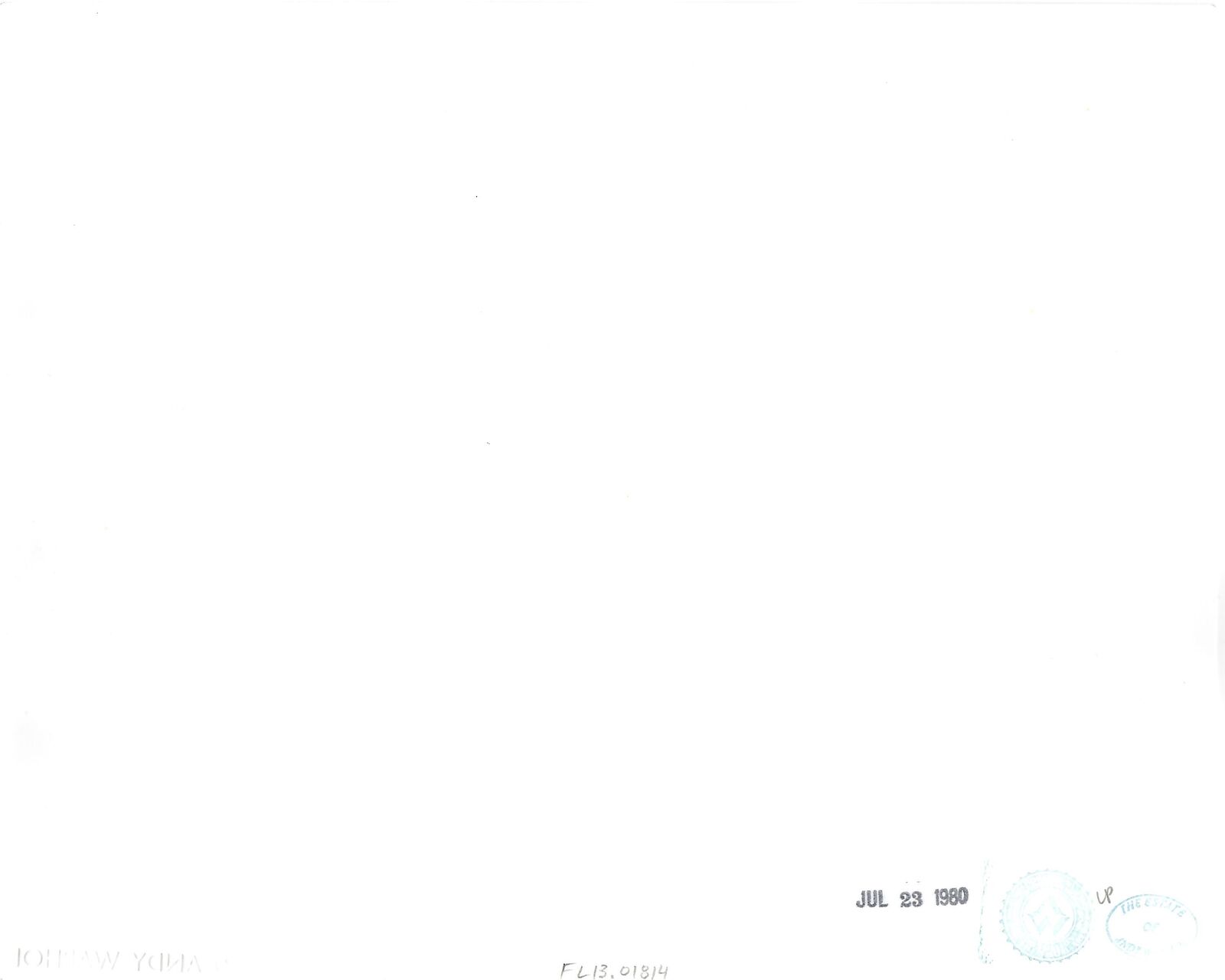 A black and white photo of people walking down the street.