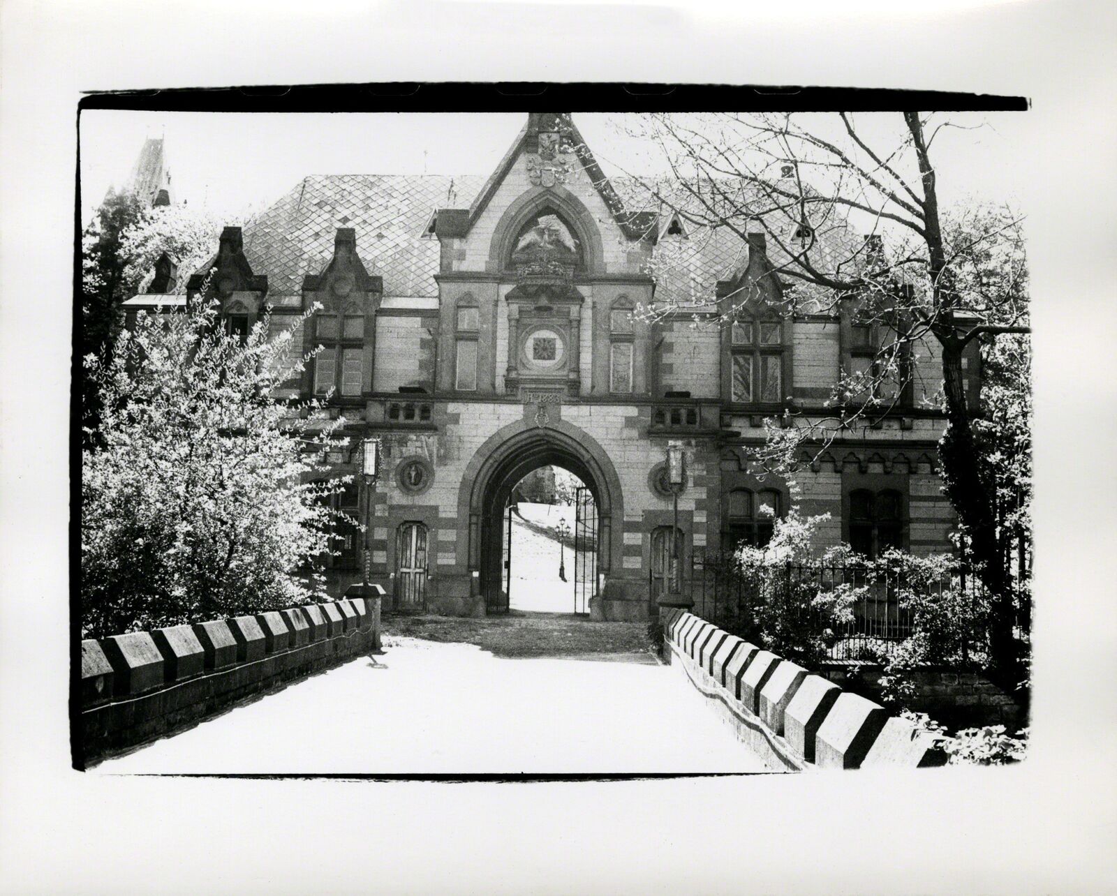 A black and white photo of an old building.