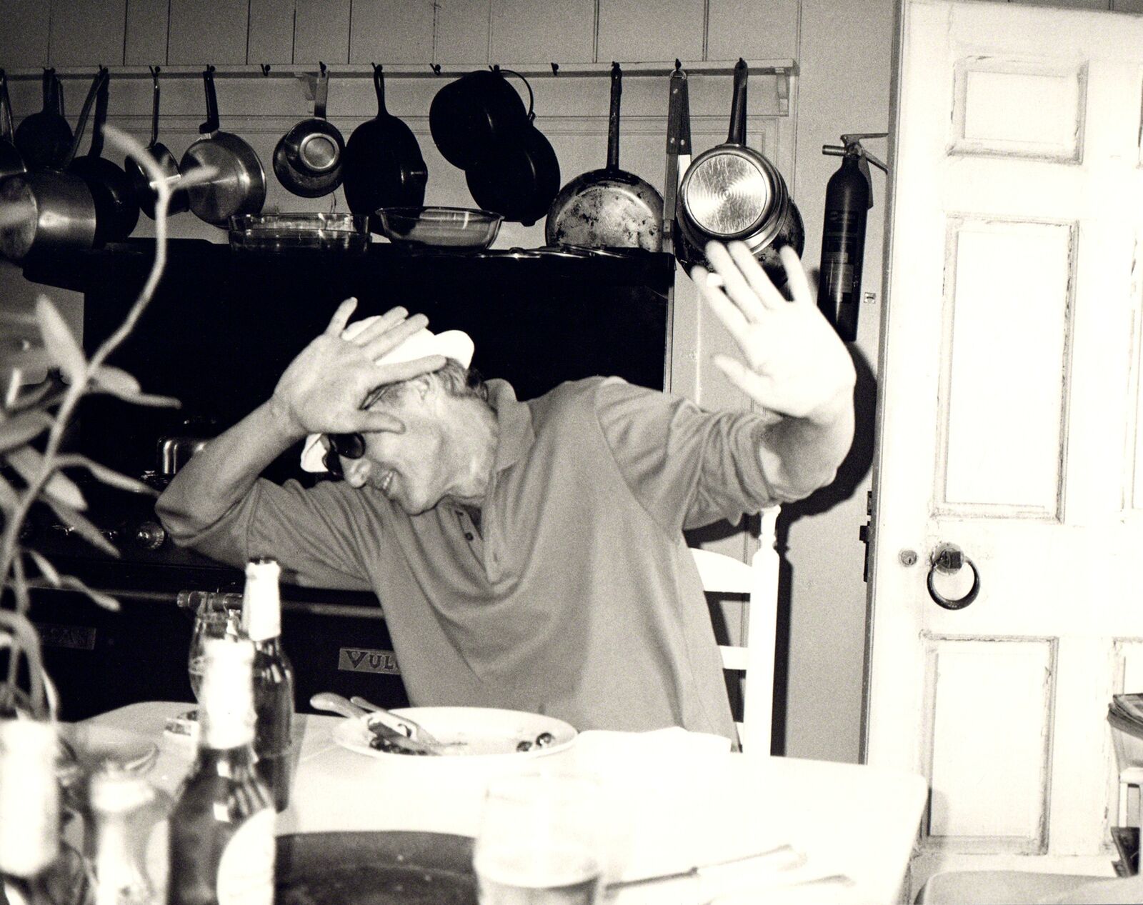 Artwork by Andy Warhol, Photograph of Halston in kitchen, Made of Silver gelatin print 