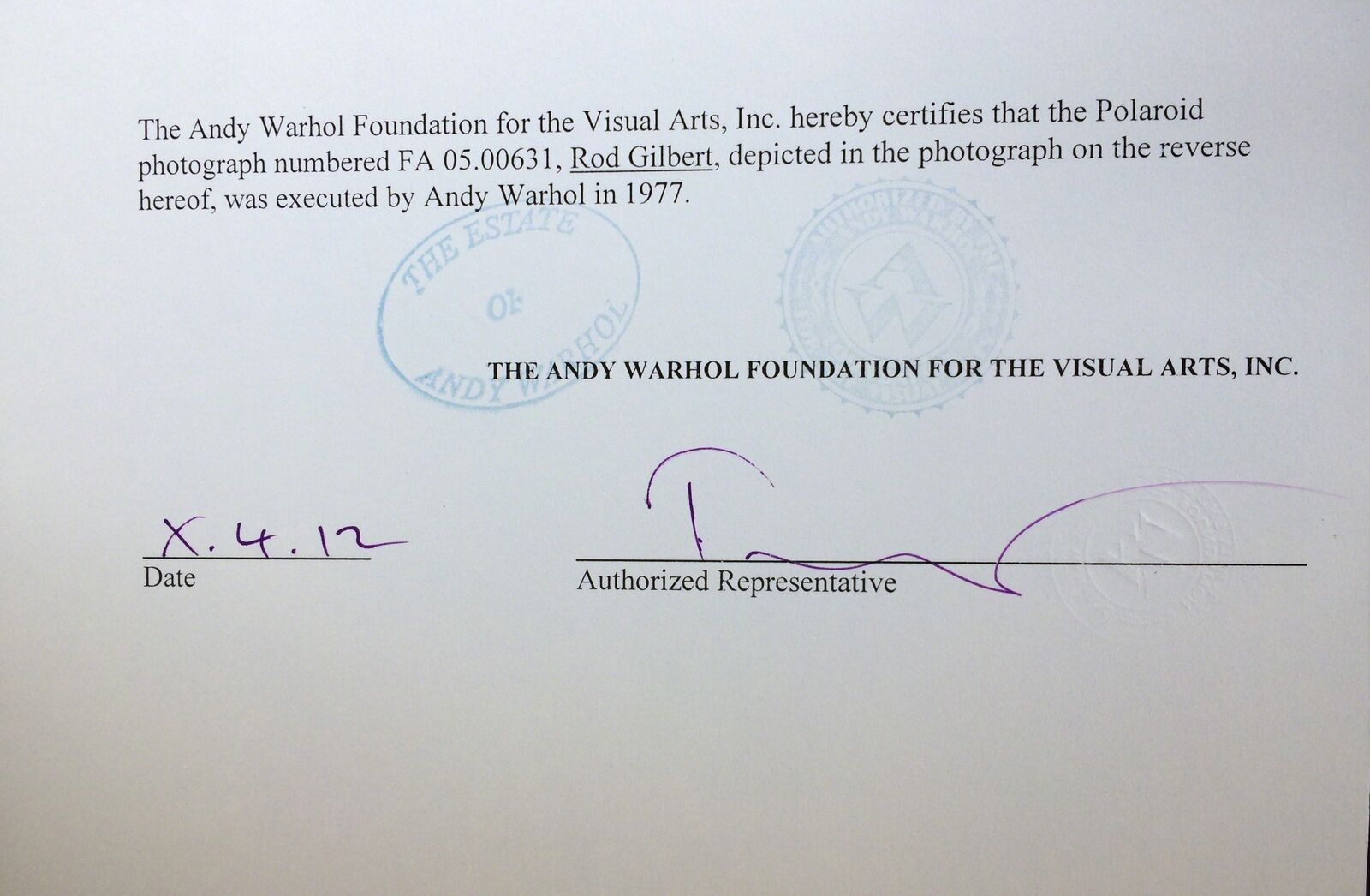 A man holding a hockey stick in his hand.