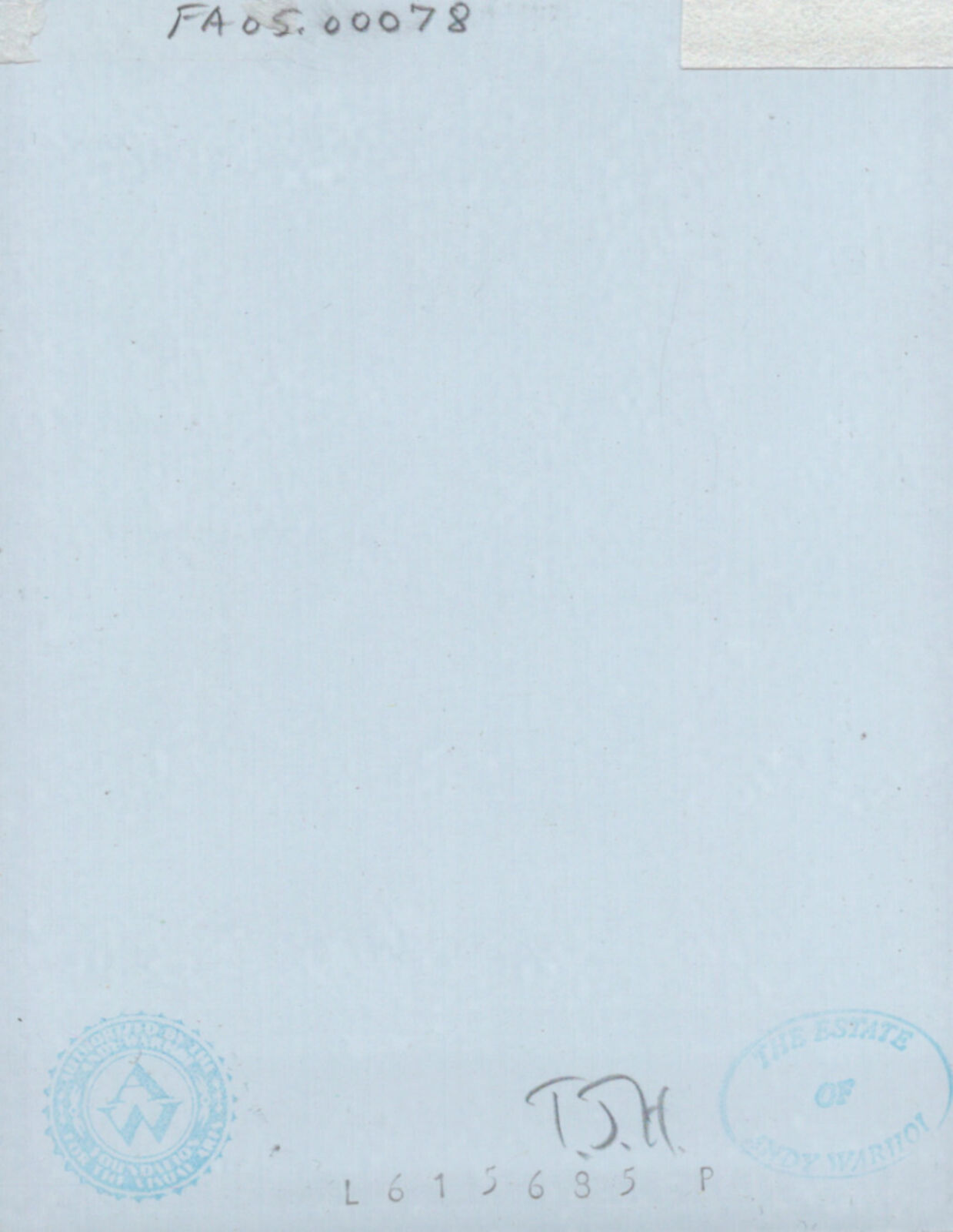 A woman with a black dress and gold earrings in her hair.