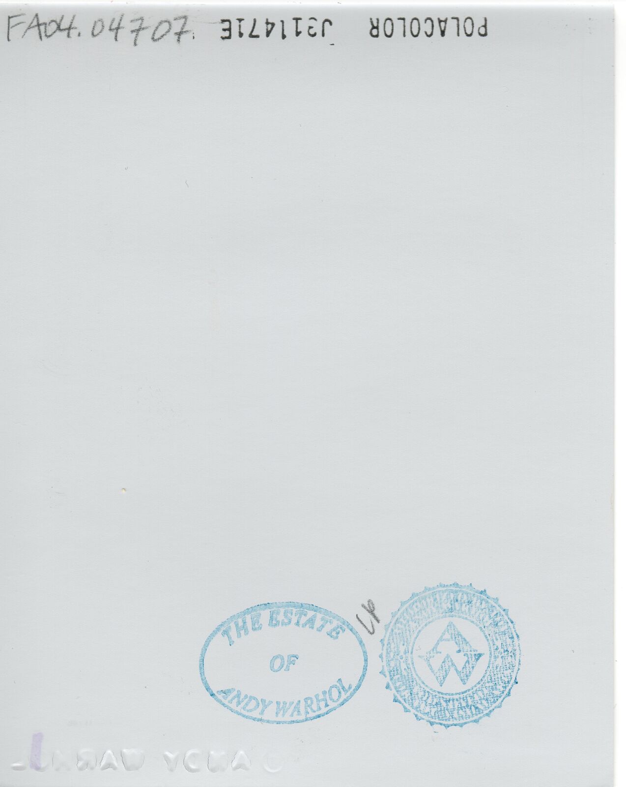 A woman in a blue dress posing for a picture.