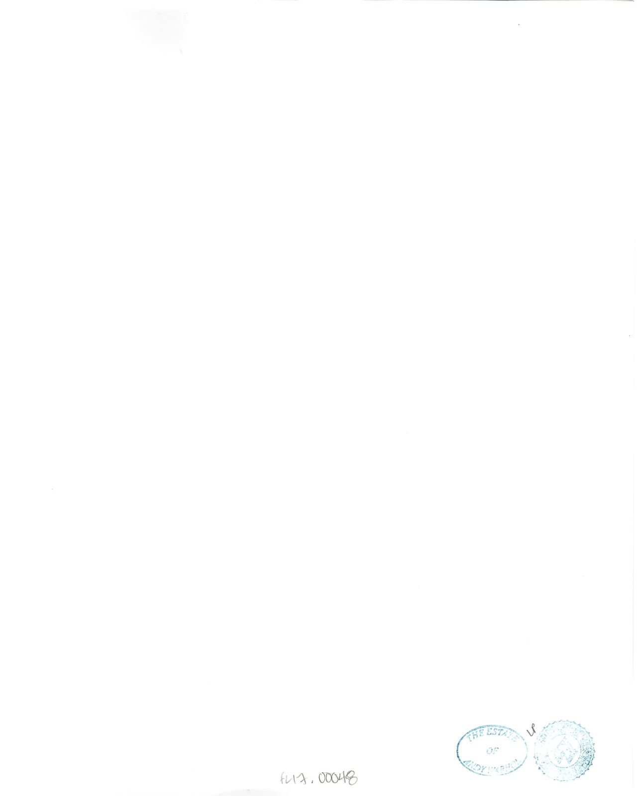 A black and white photo of a room with a skylight.