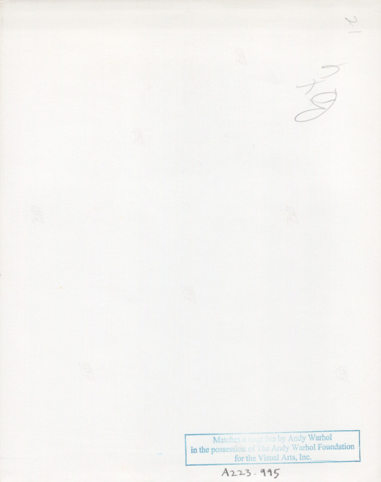 A young boy in a black and white photo with a badge on his jacket.