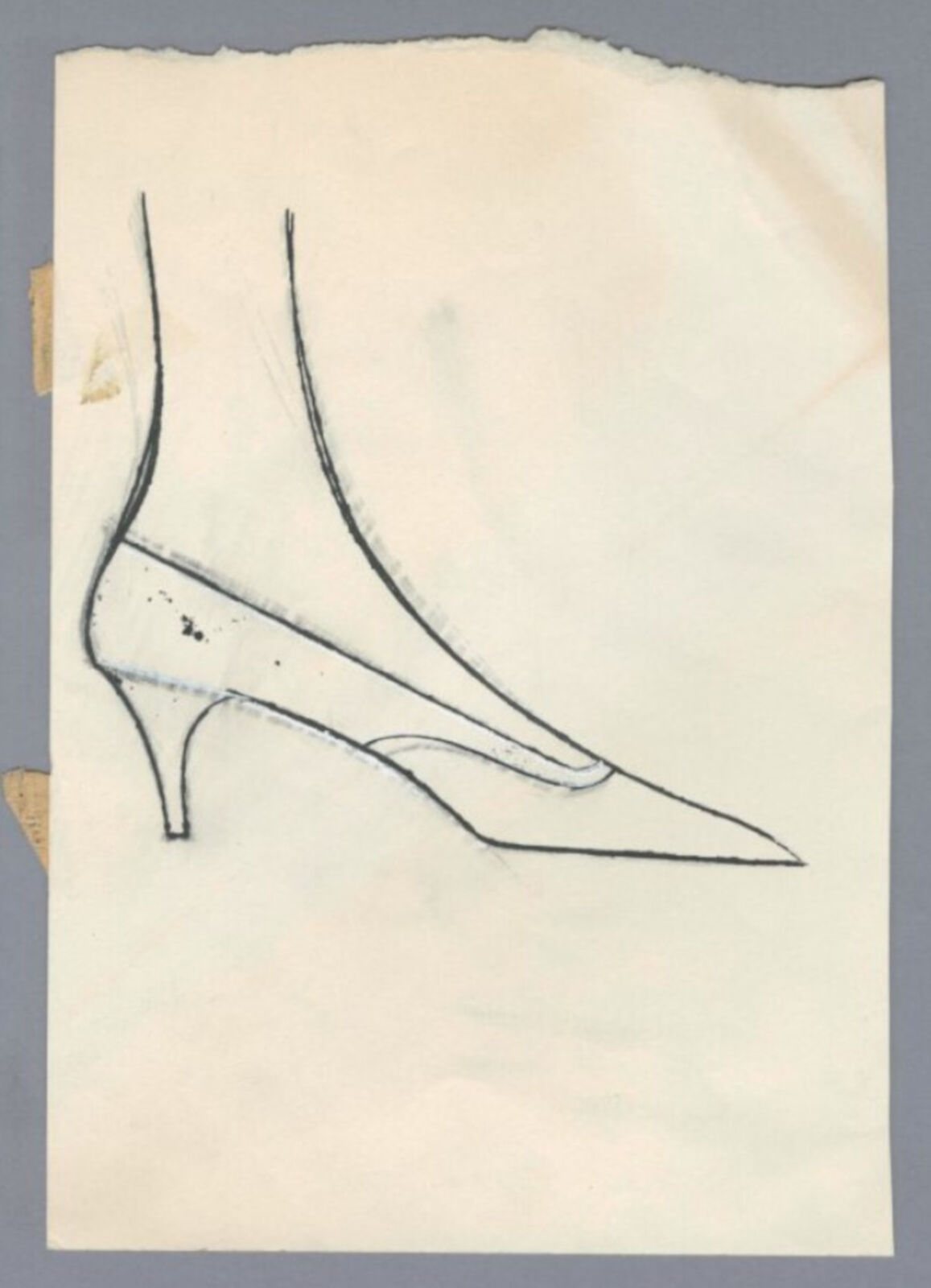 A drawing of a pair of shoes on a piece of paper.