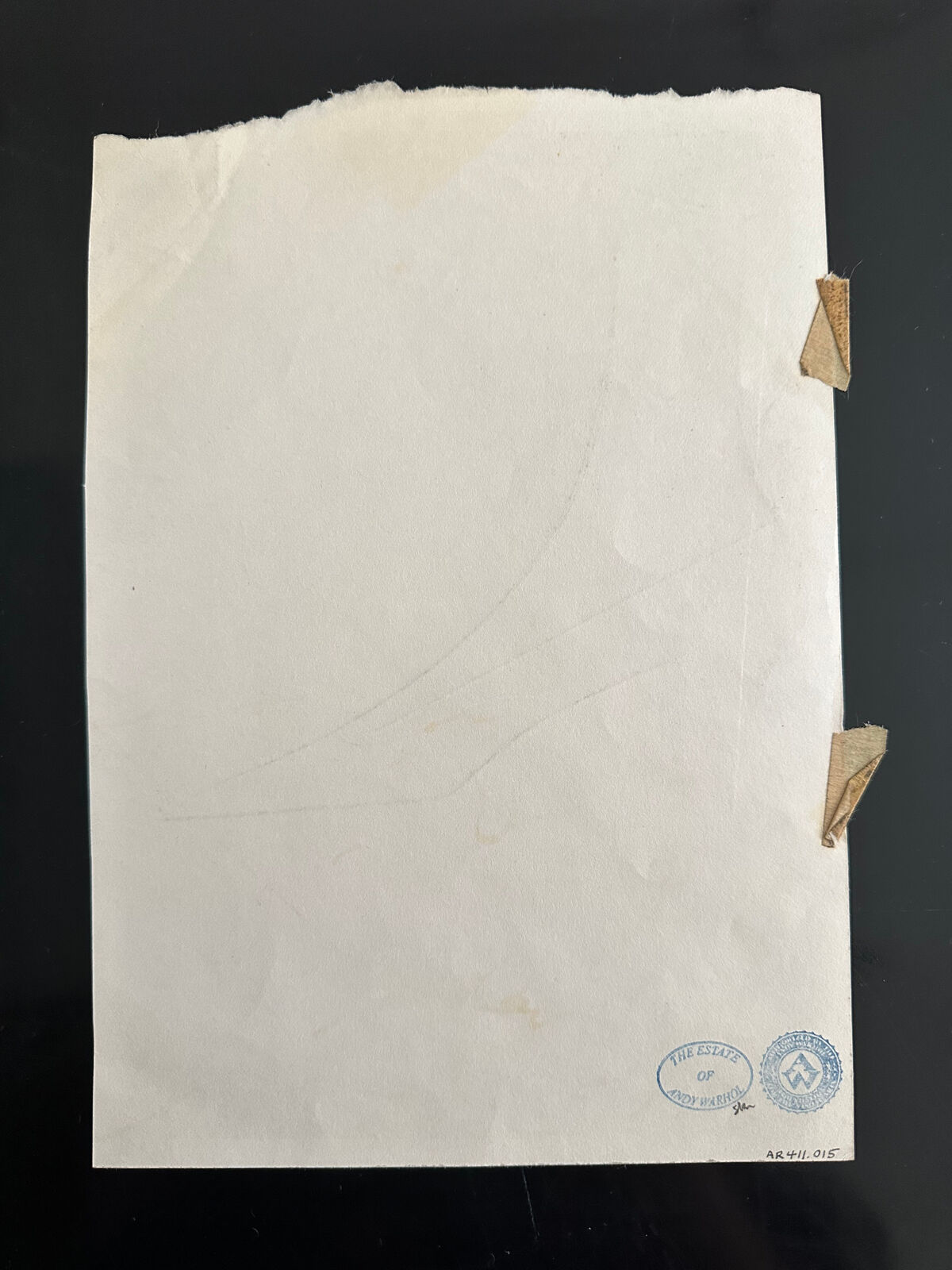 A drawing of a pair of shoes on a piece of paper.