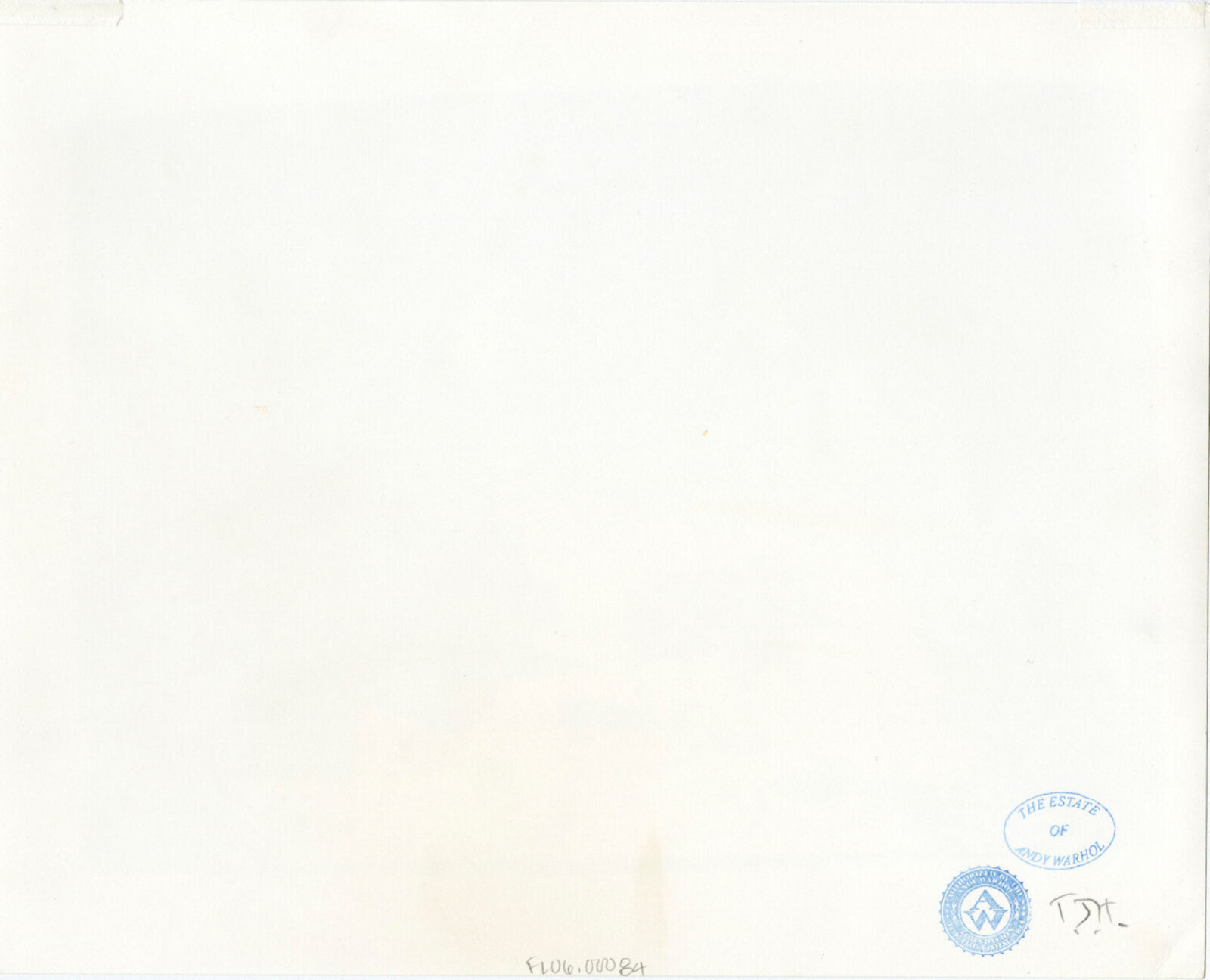 Two women sitting at a table talking to each other.