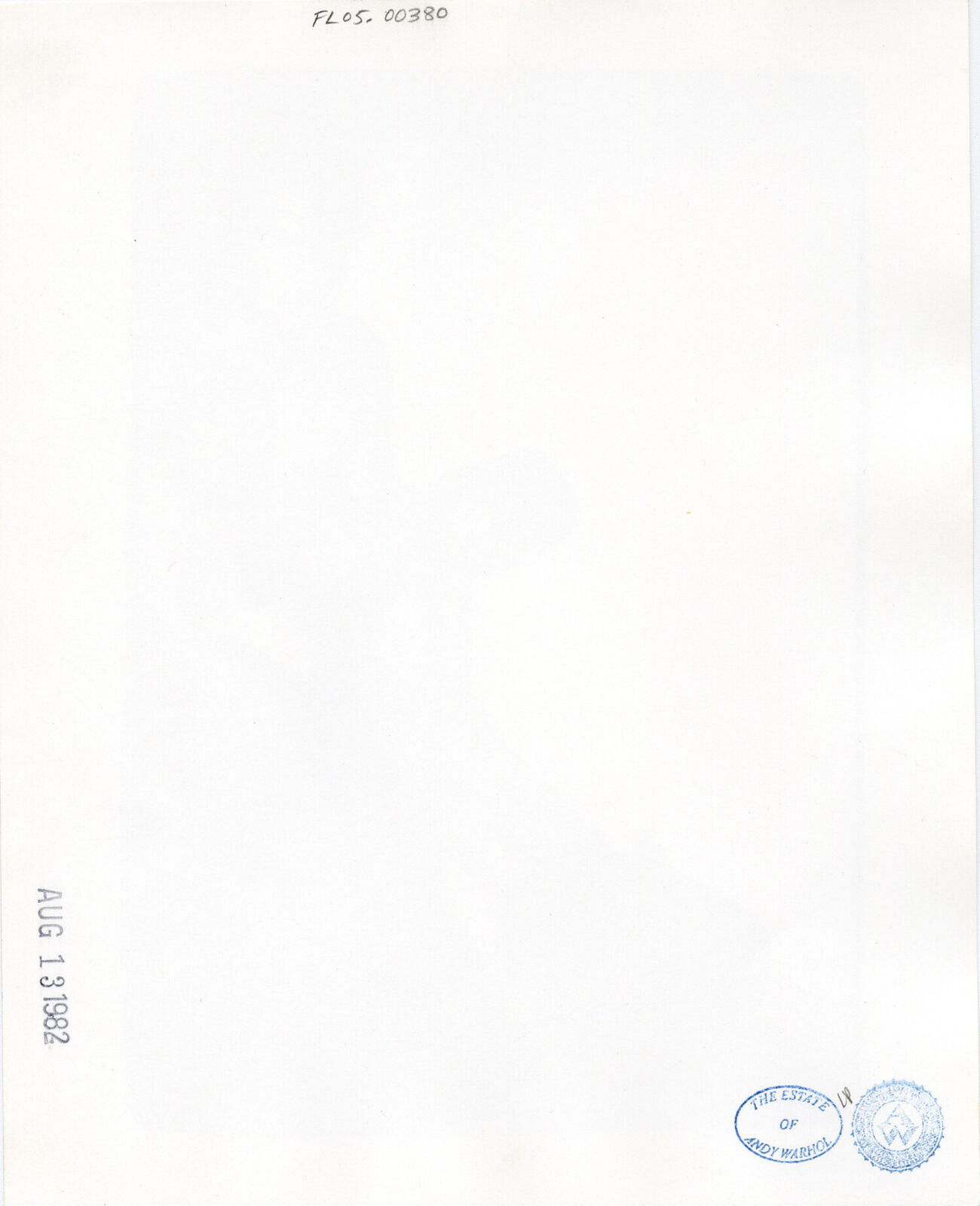 A black and white photo of a man sitting on a gym machine.