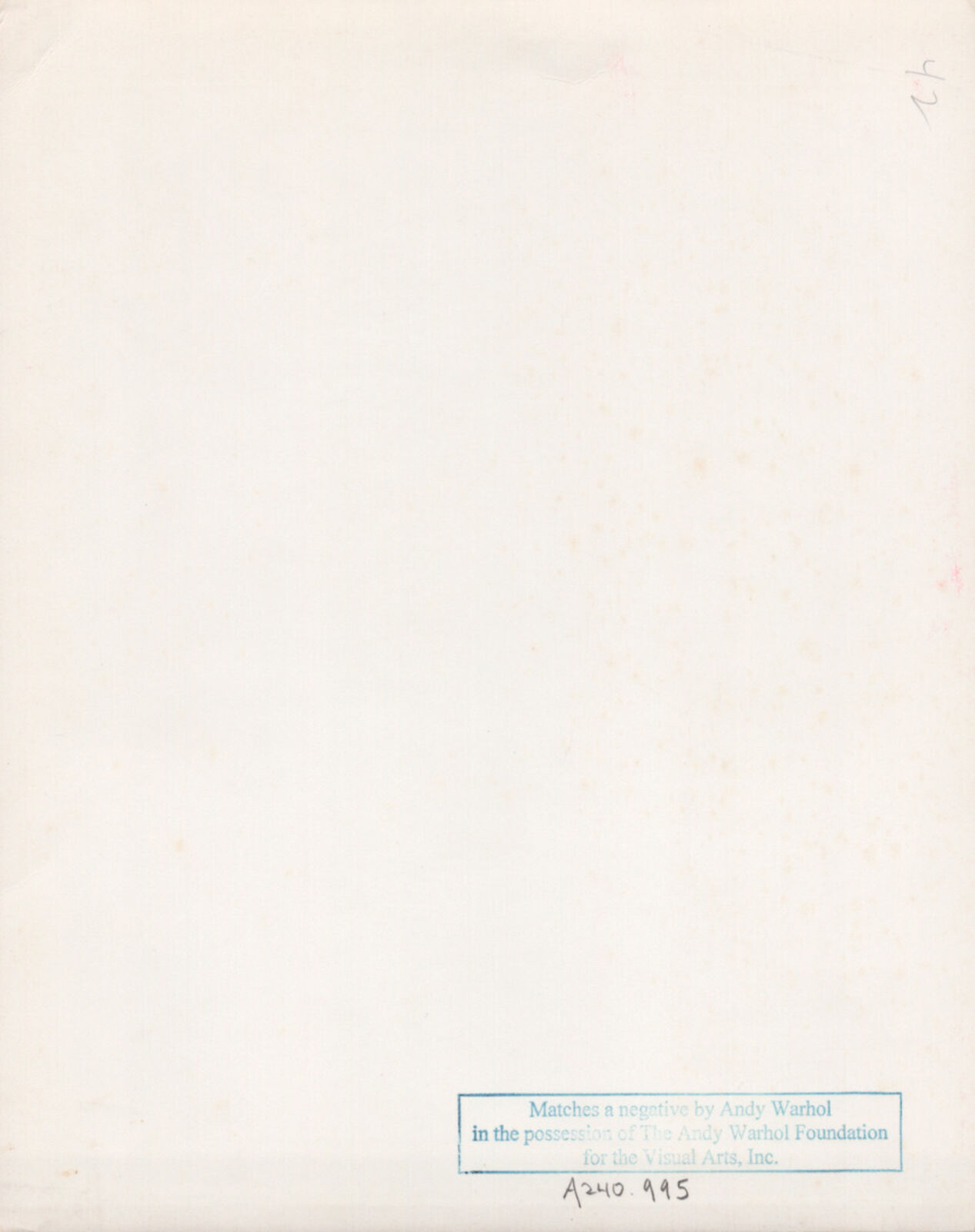 A black and white photo of a man doing a handstand.