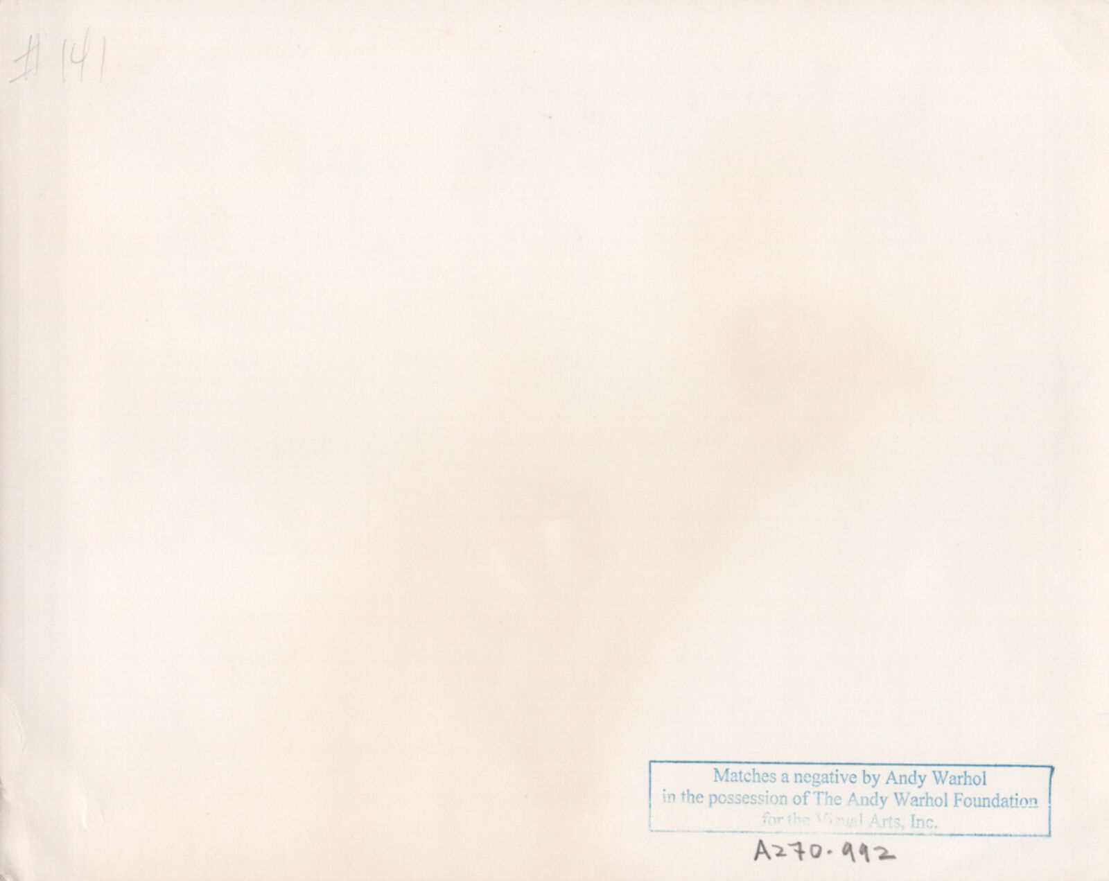 A black and white photo of a man and a woman laying on a bench.