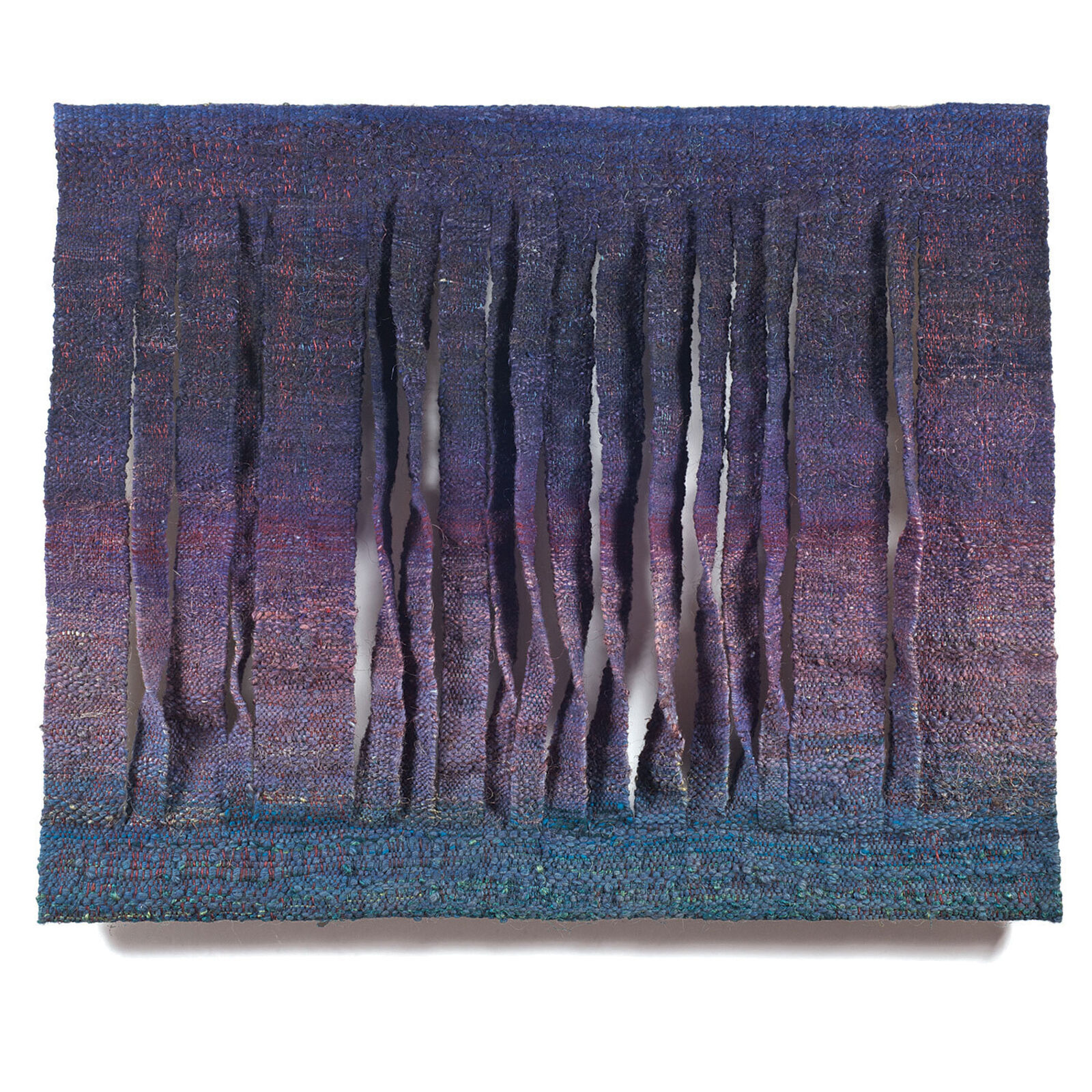 A blue and purple wall hanging on a white wall.