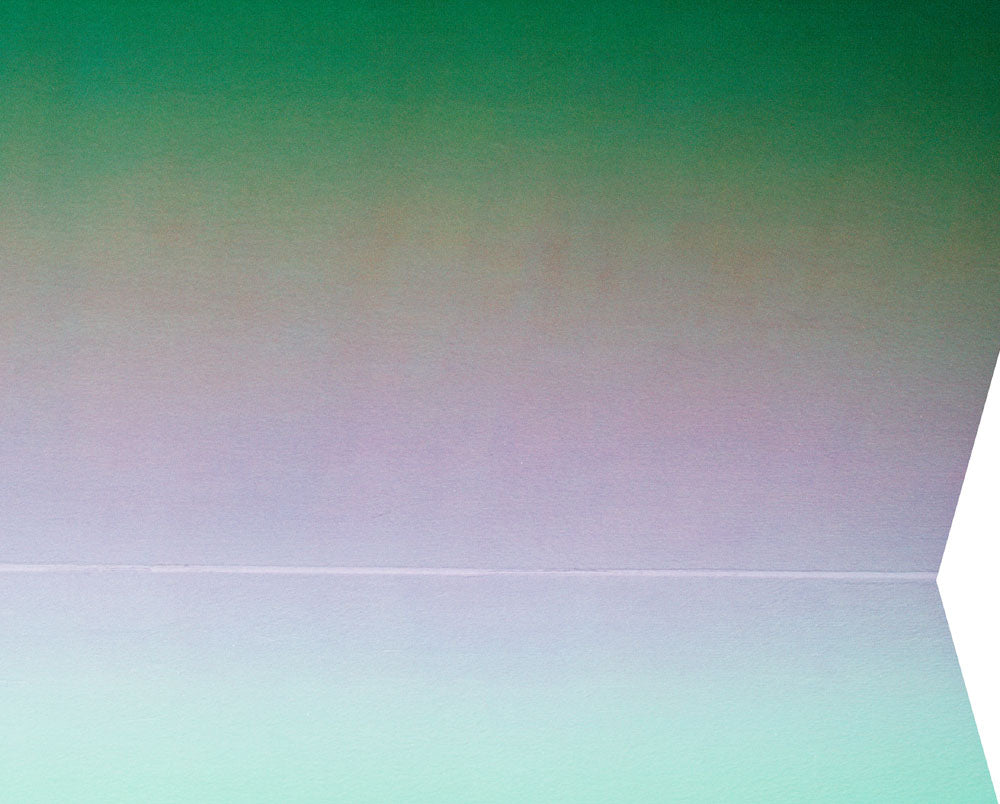 A picture of a green and purple abstract painting on a white background.