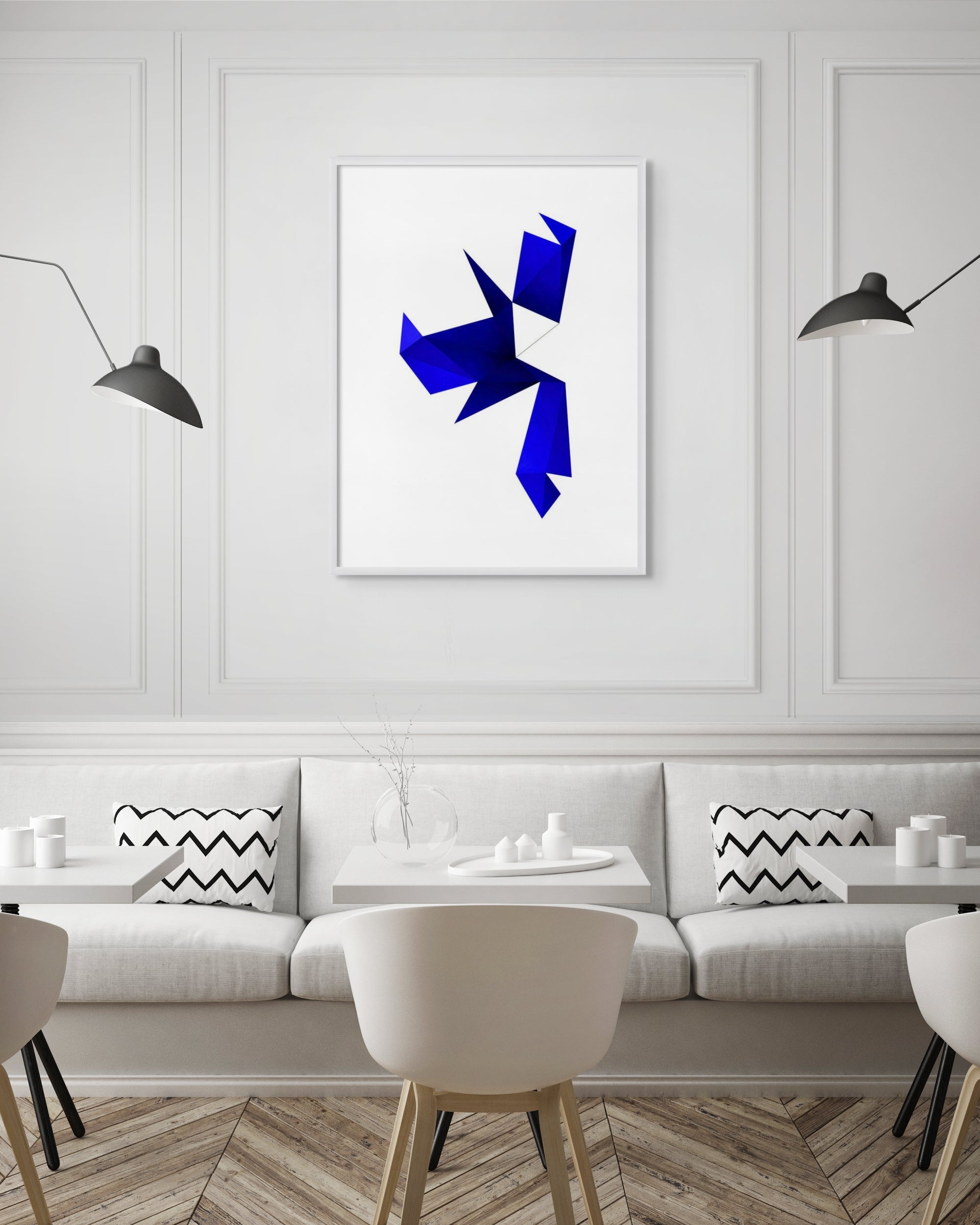 A blue origami bird on a white background.
