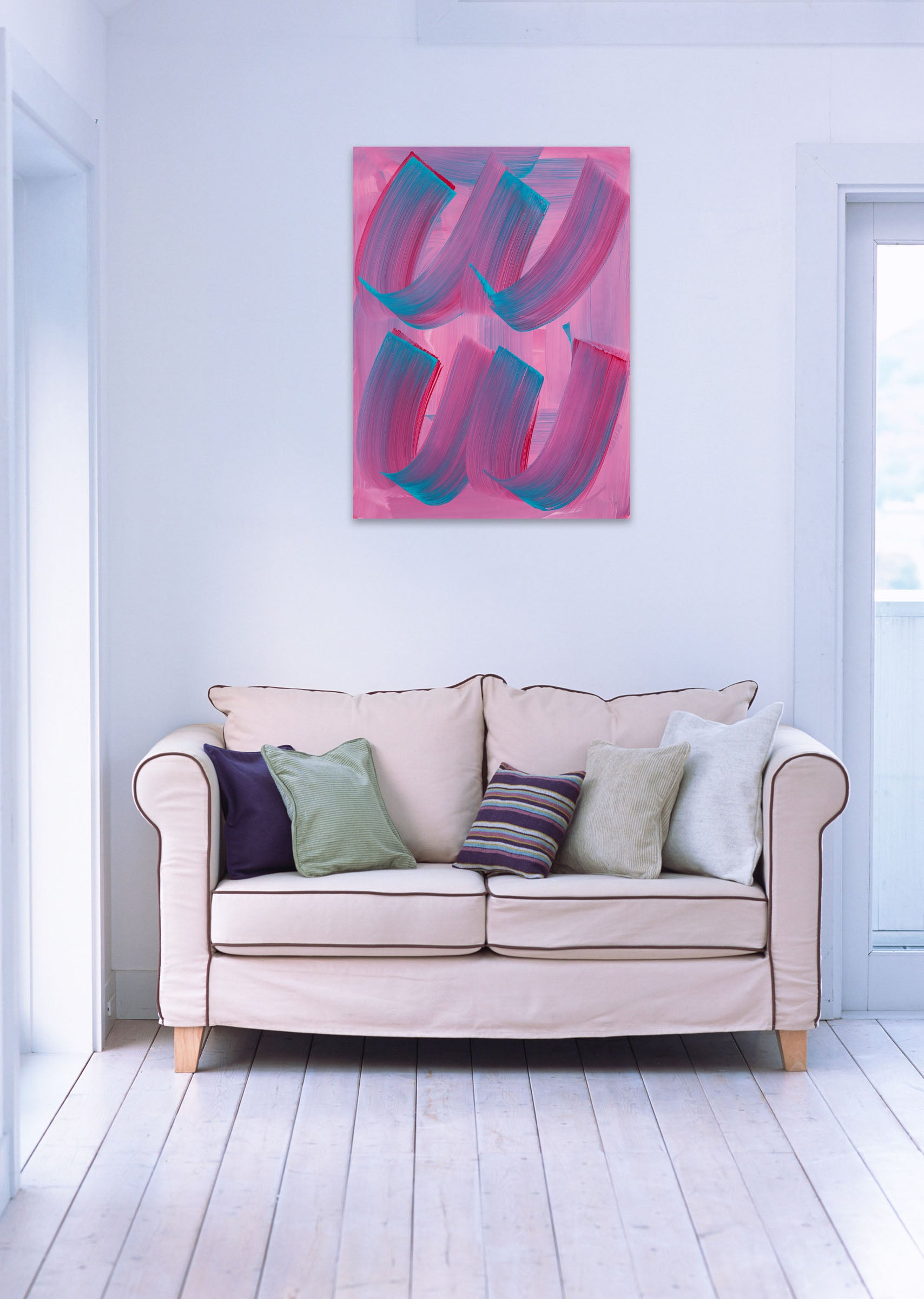 A pink and blue painting on a white wall.